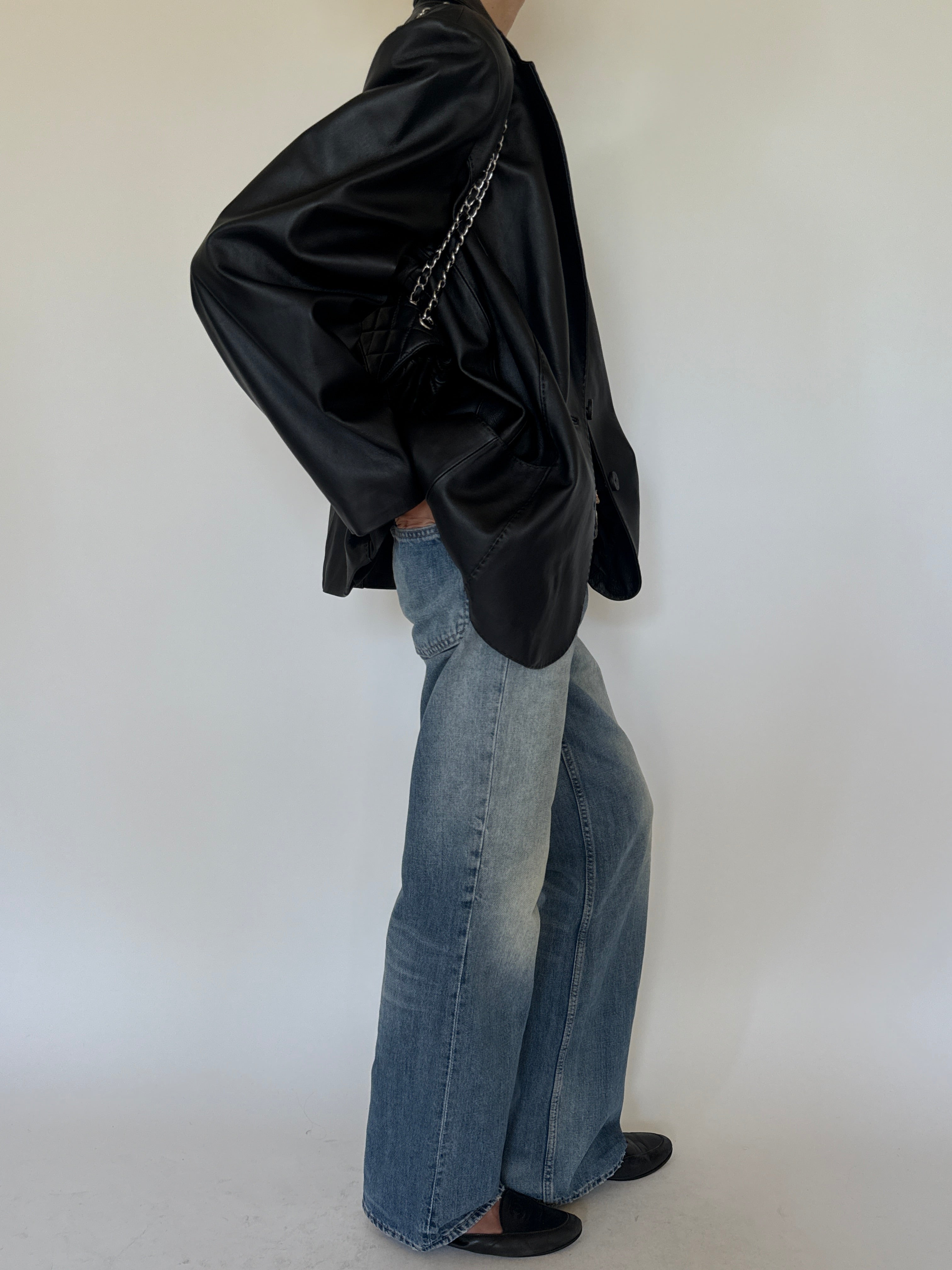 Vintage black leather and topstitching close-up