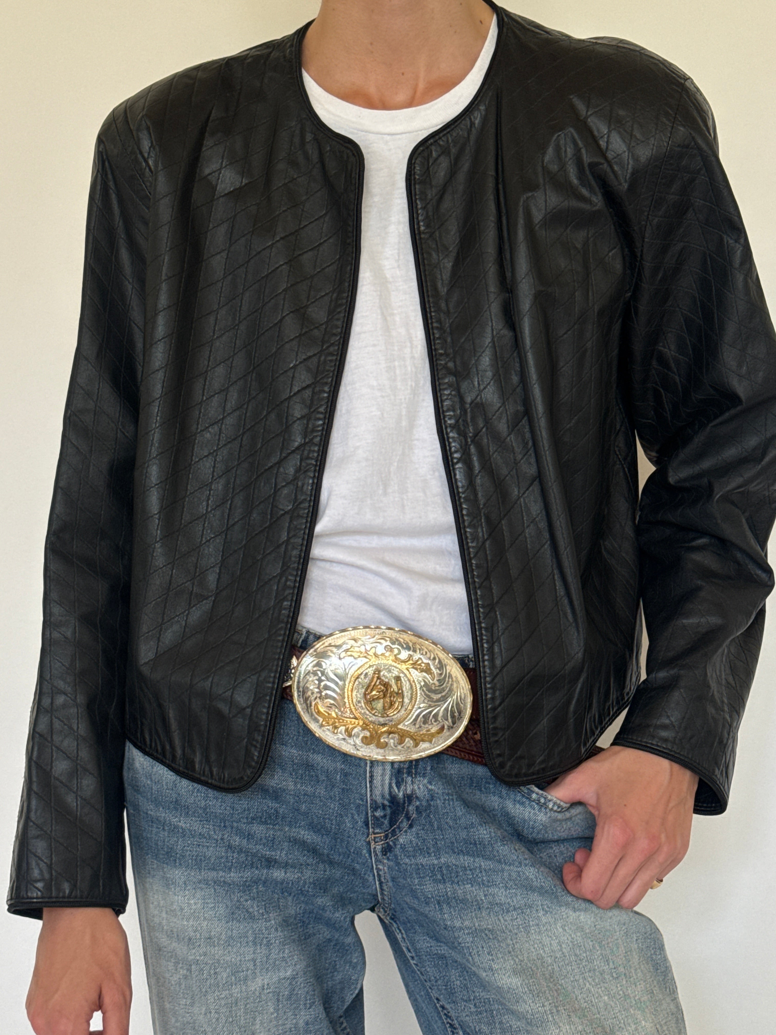 Vintage black quilted leather jacket front view