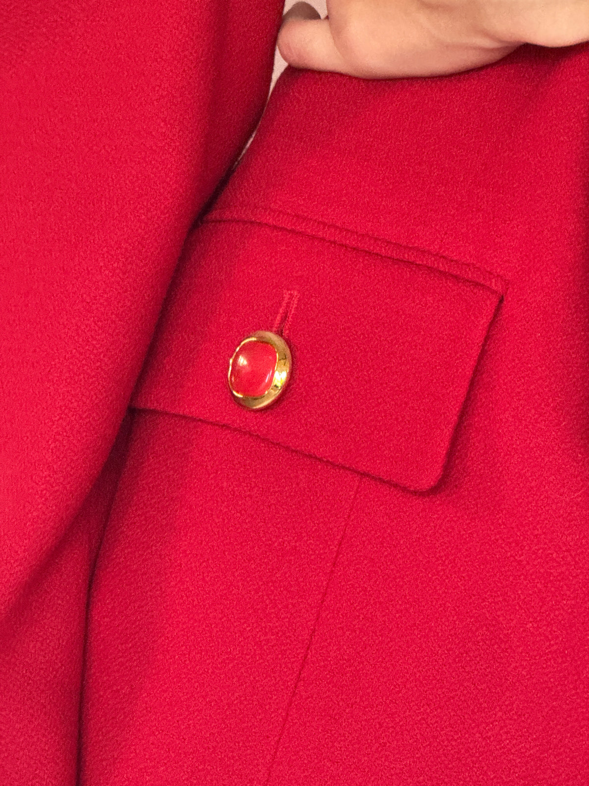 Vintage red wool jacket fabric close-up