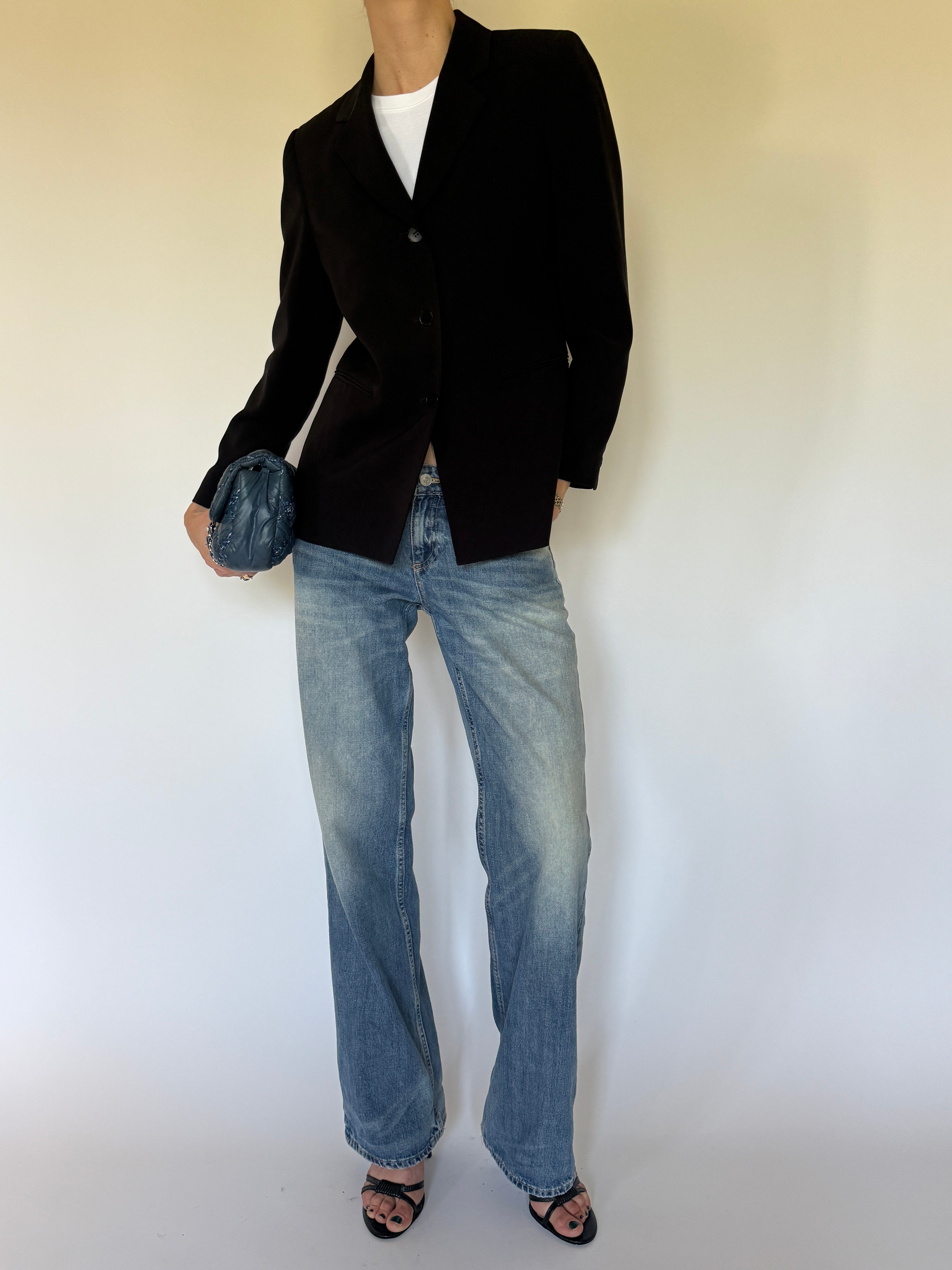 Vintage black tailored blazer styled with denim