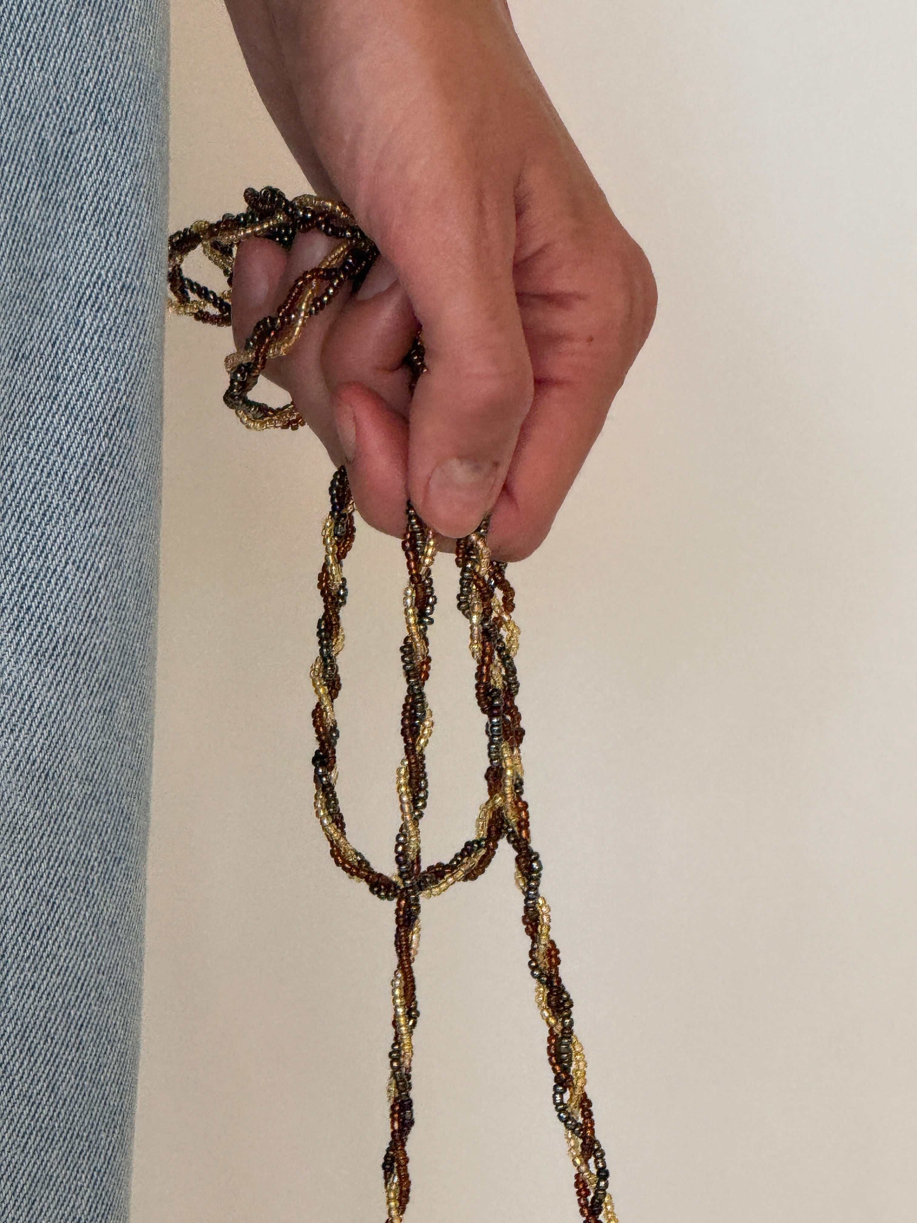 Vintage potli bag twisted beaded strap detail
