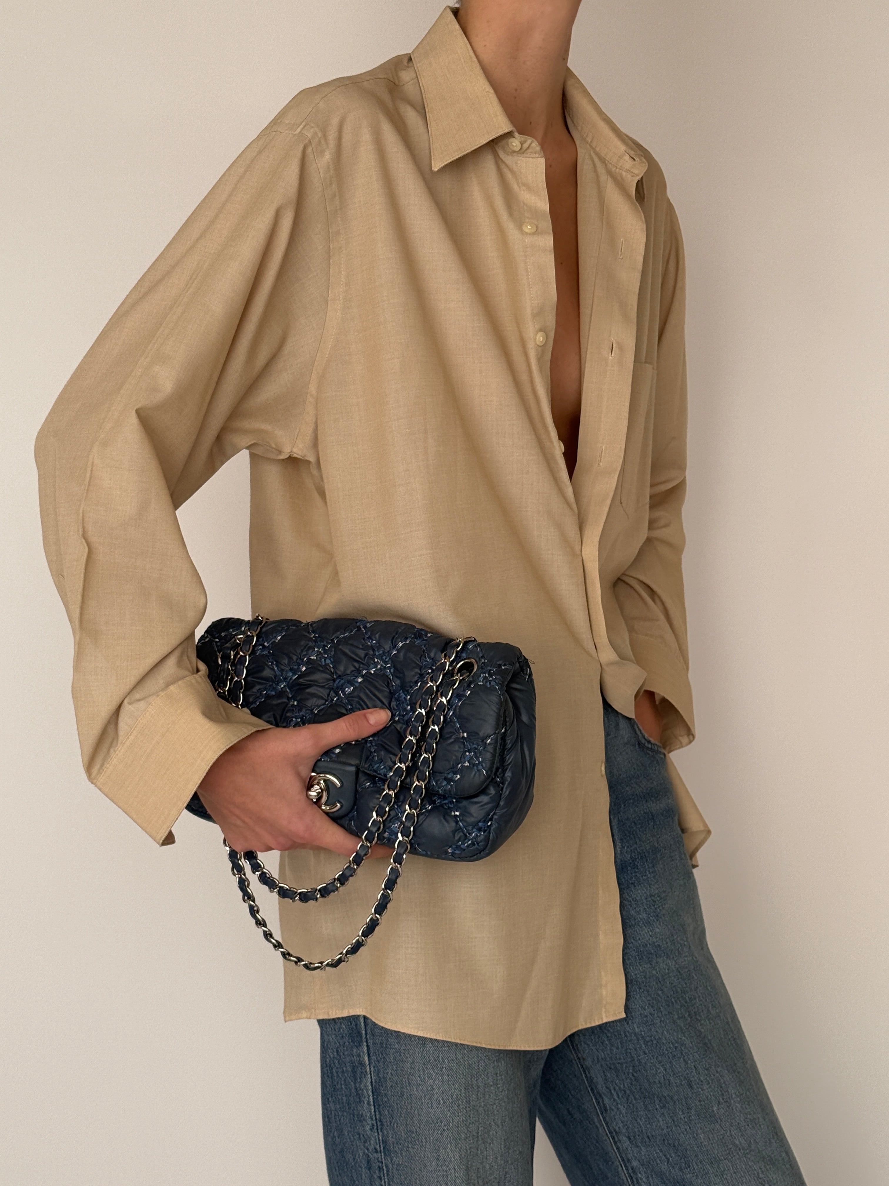 Vintage oversized button-up shirt beige close-up