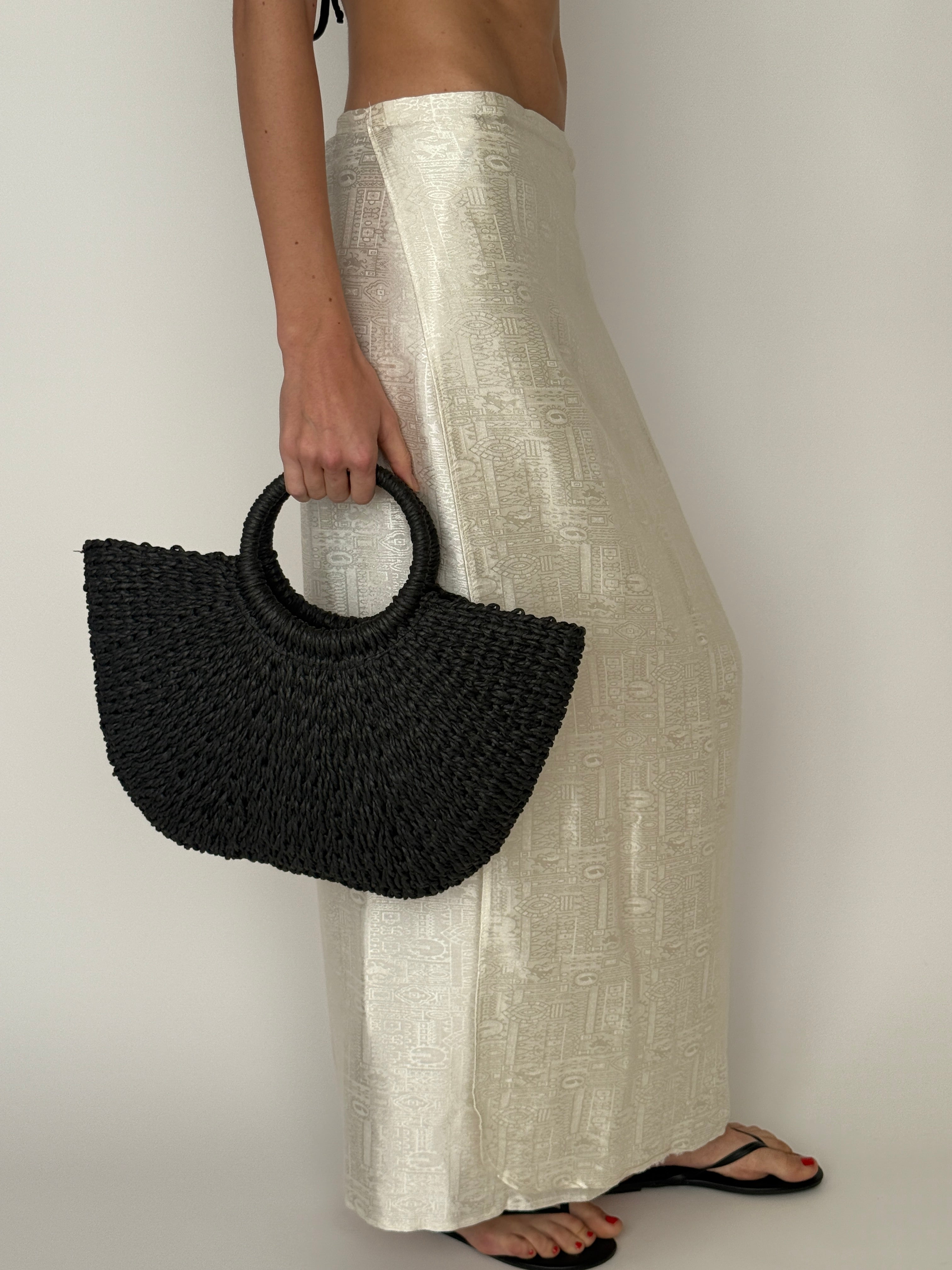 Vintage black woven straw half-moon handbag front view