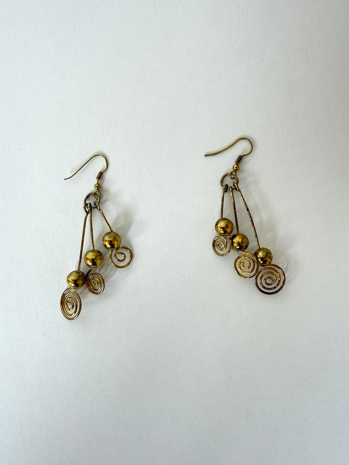 Vintage sculptural brass swirl earrings