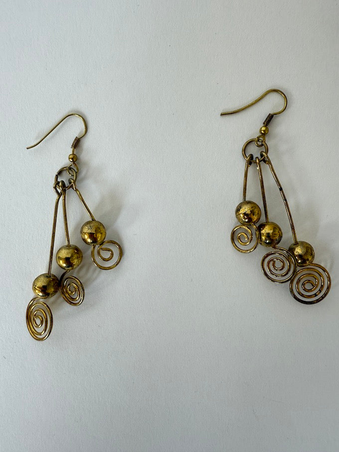 Vintage sculptural brass swirl earrings