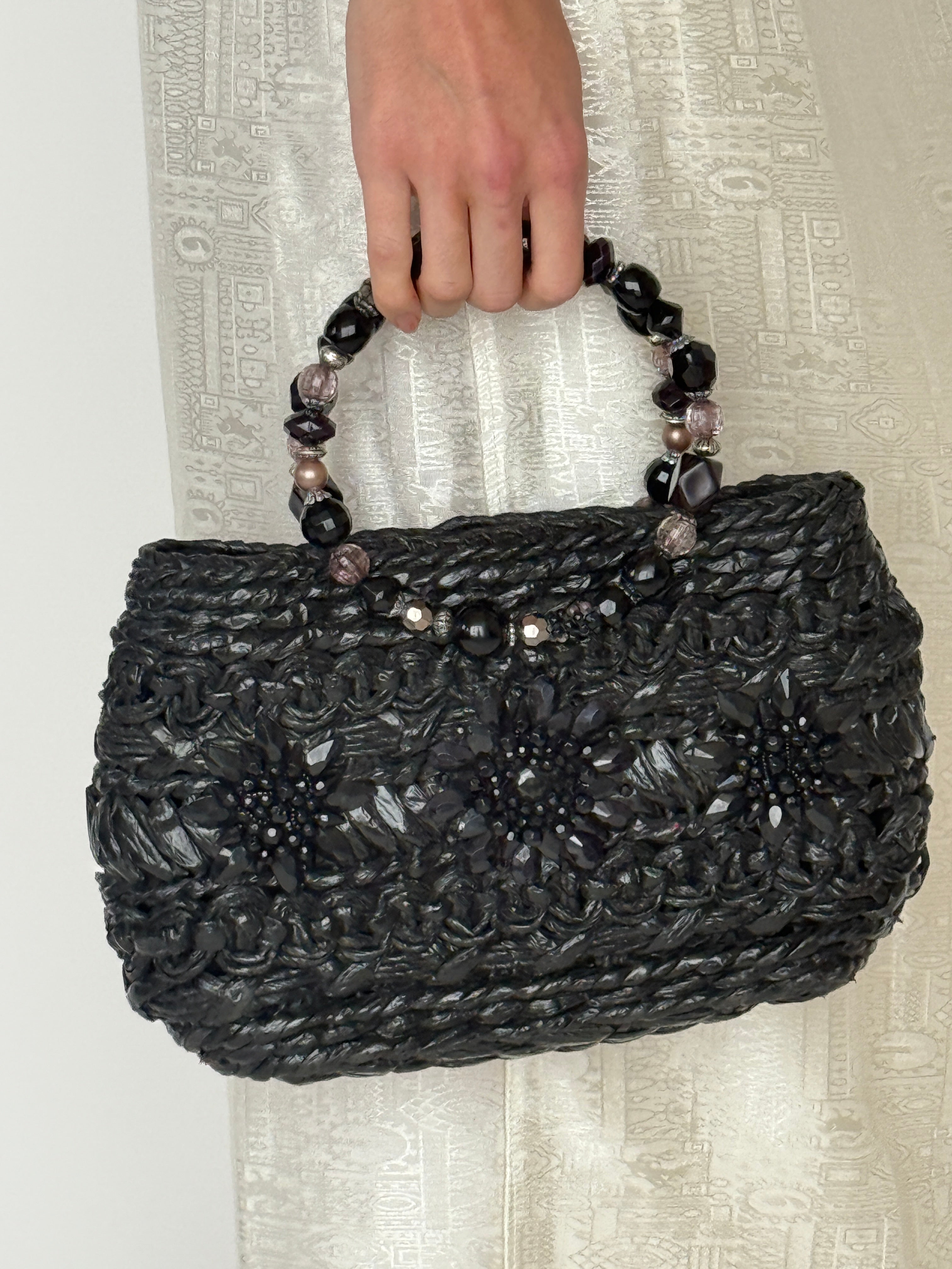 Vintage black woven handbag bead embellishment detail