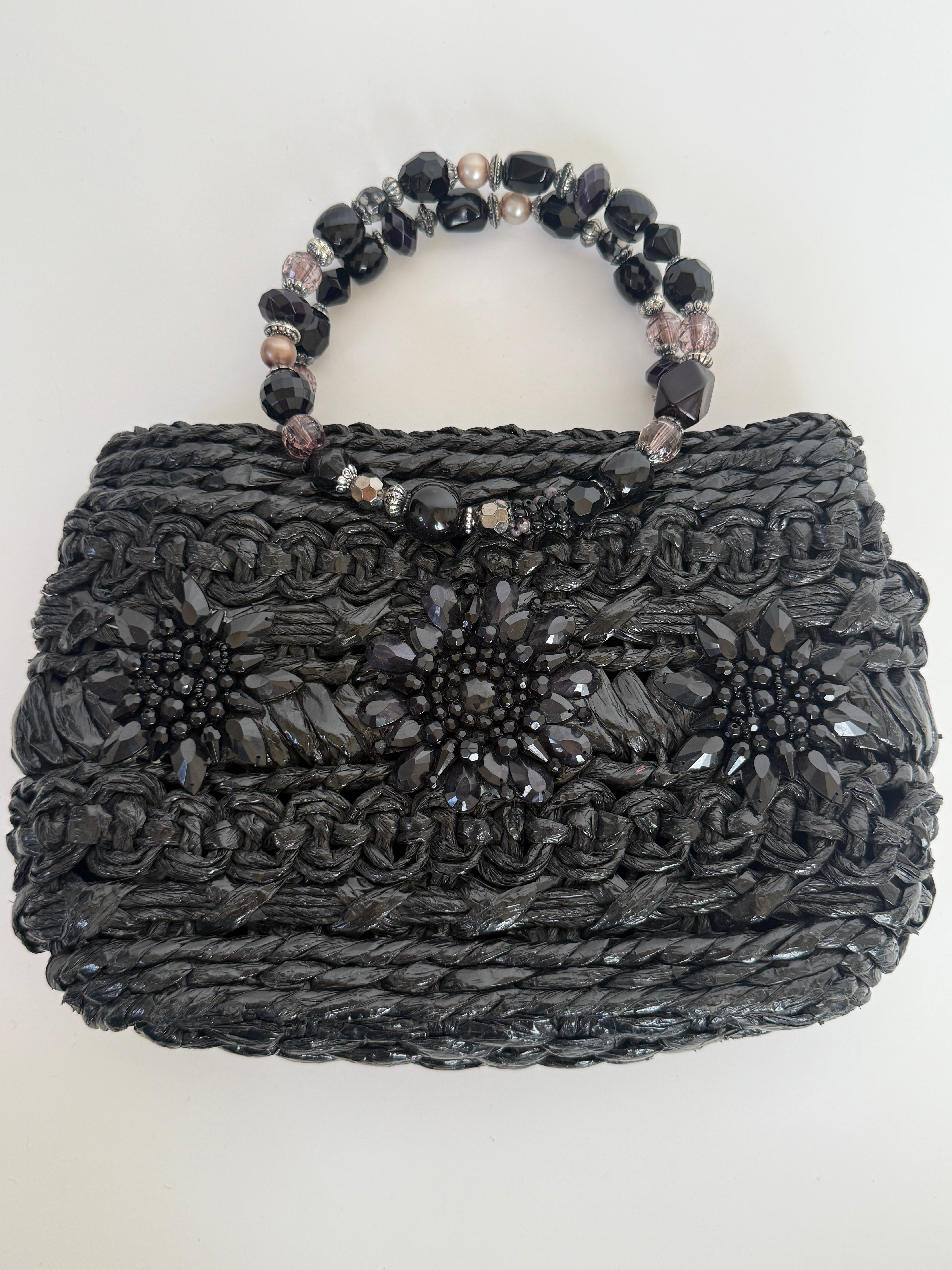 Vintage black woven handbag bead embellishment detail