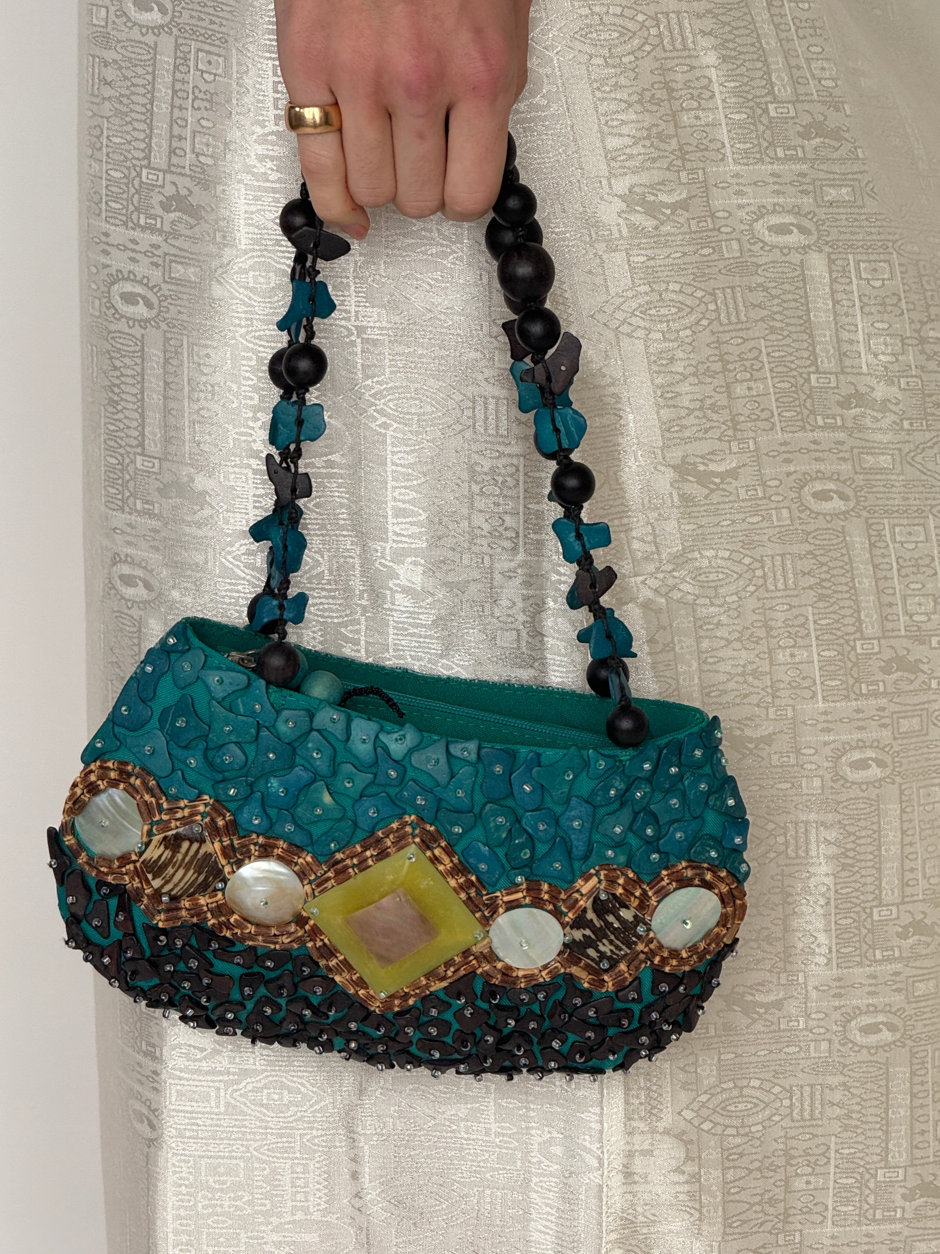Vintage beaded mini bag teal side angle