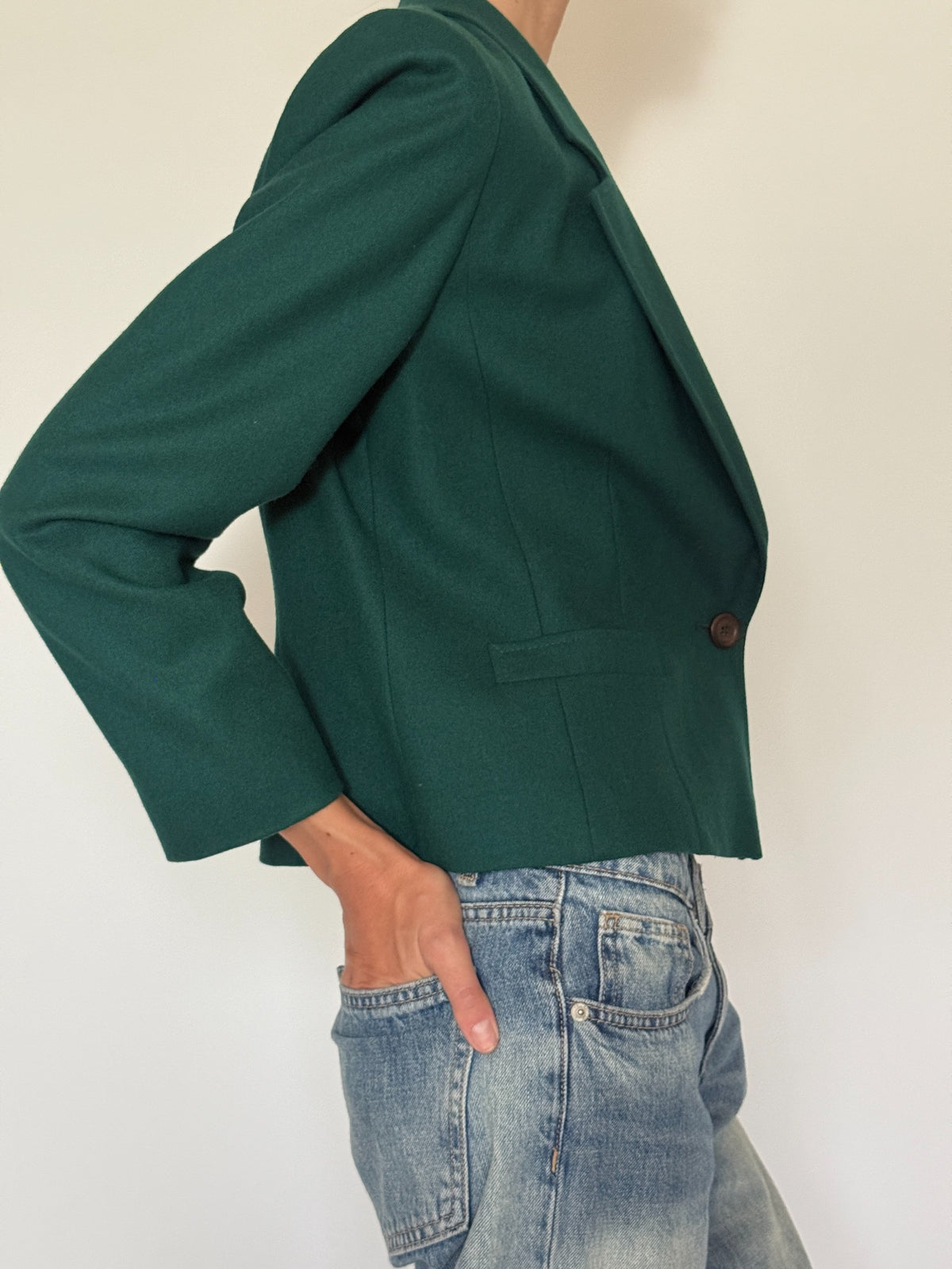 Side view of cropped tailored wool blazer