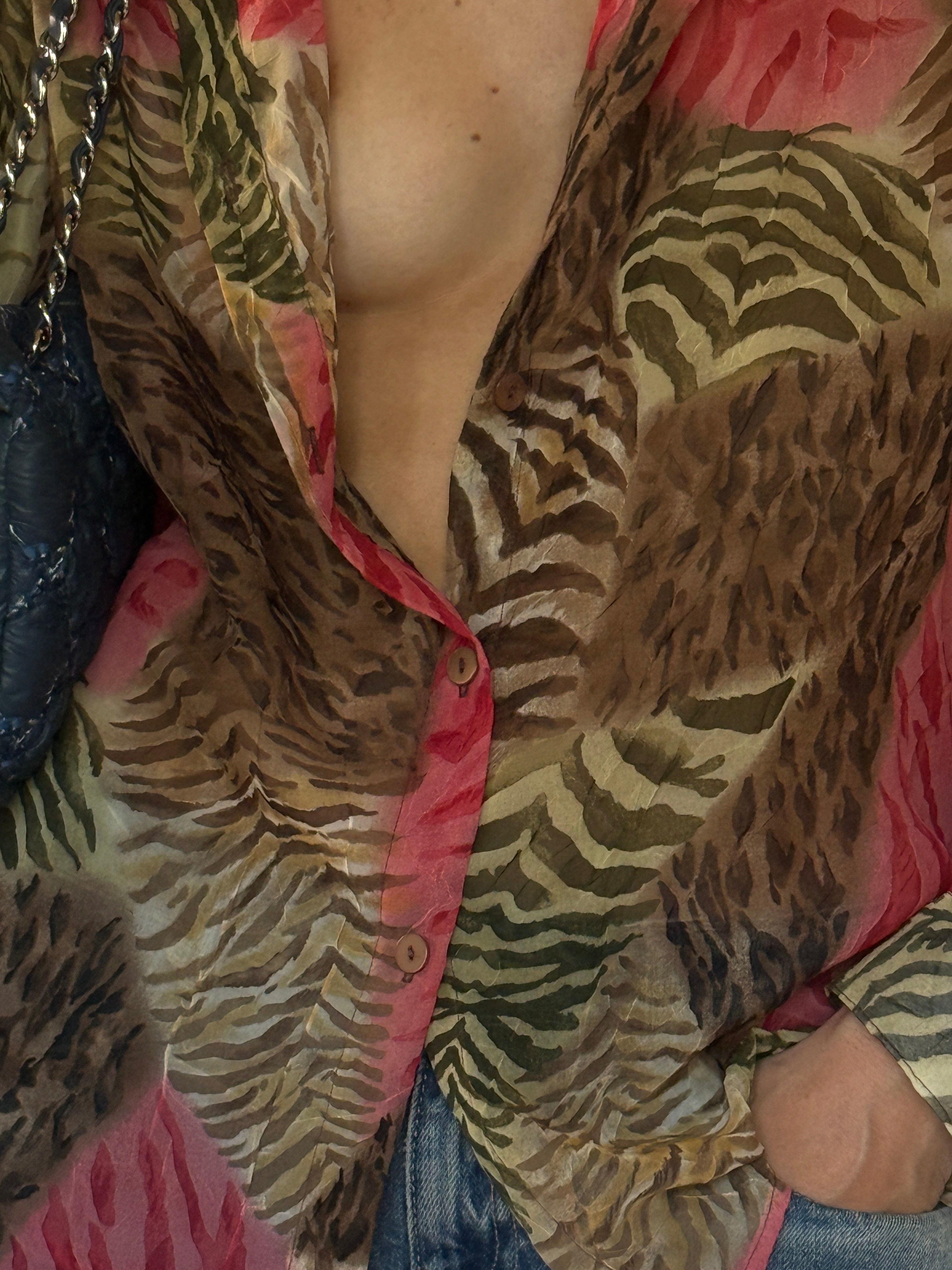 Vintage sheer fabric close-up with animal-inspired pattern