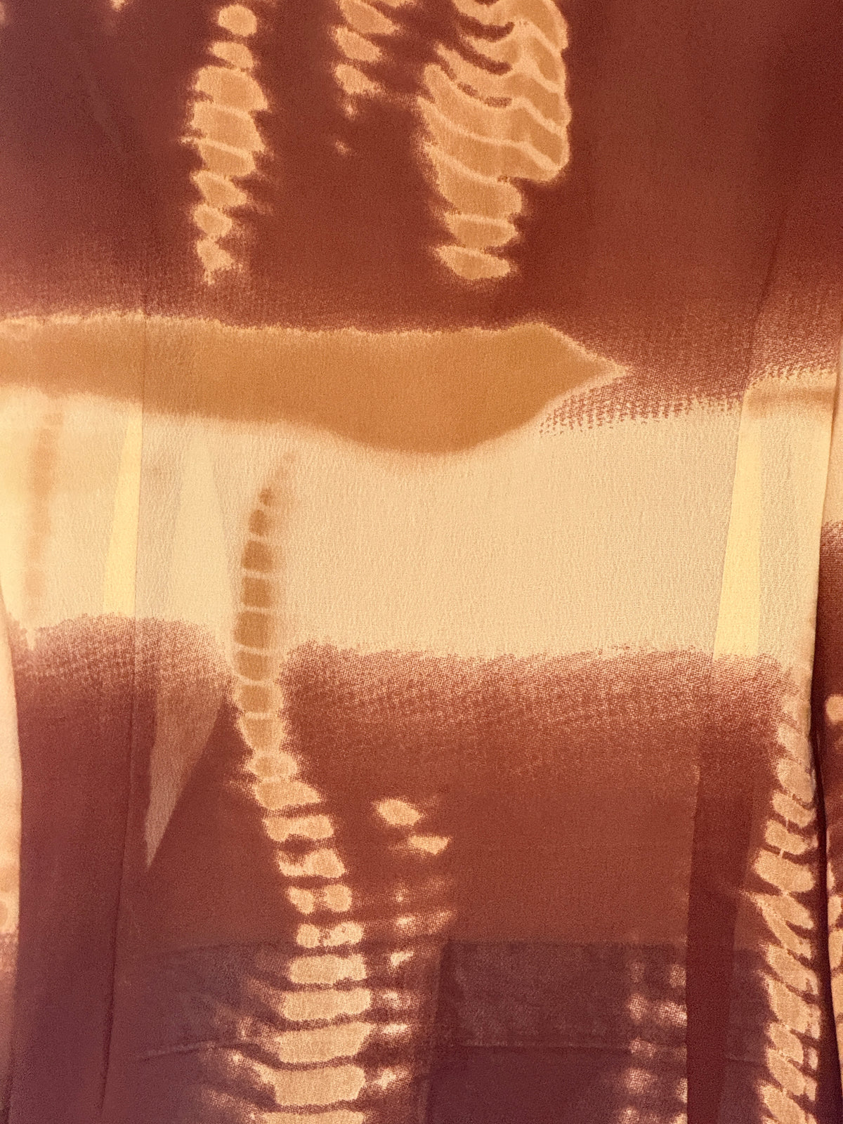 Vintage brown and camel blouse fabric close-up