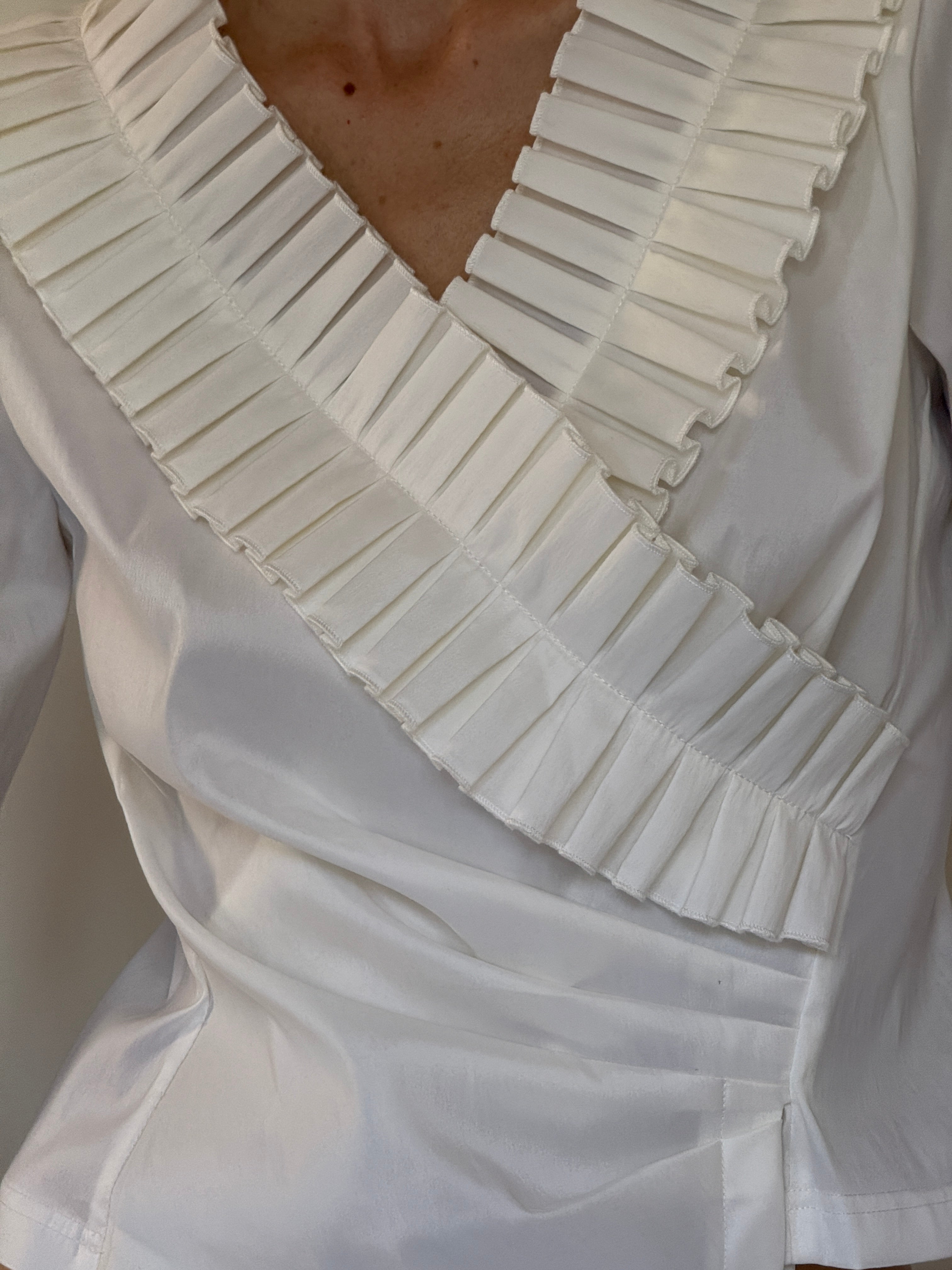 Vintage pleated ruffle neckline close-up detail