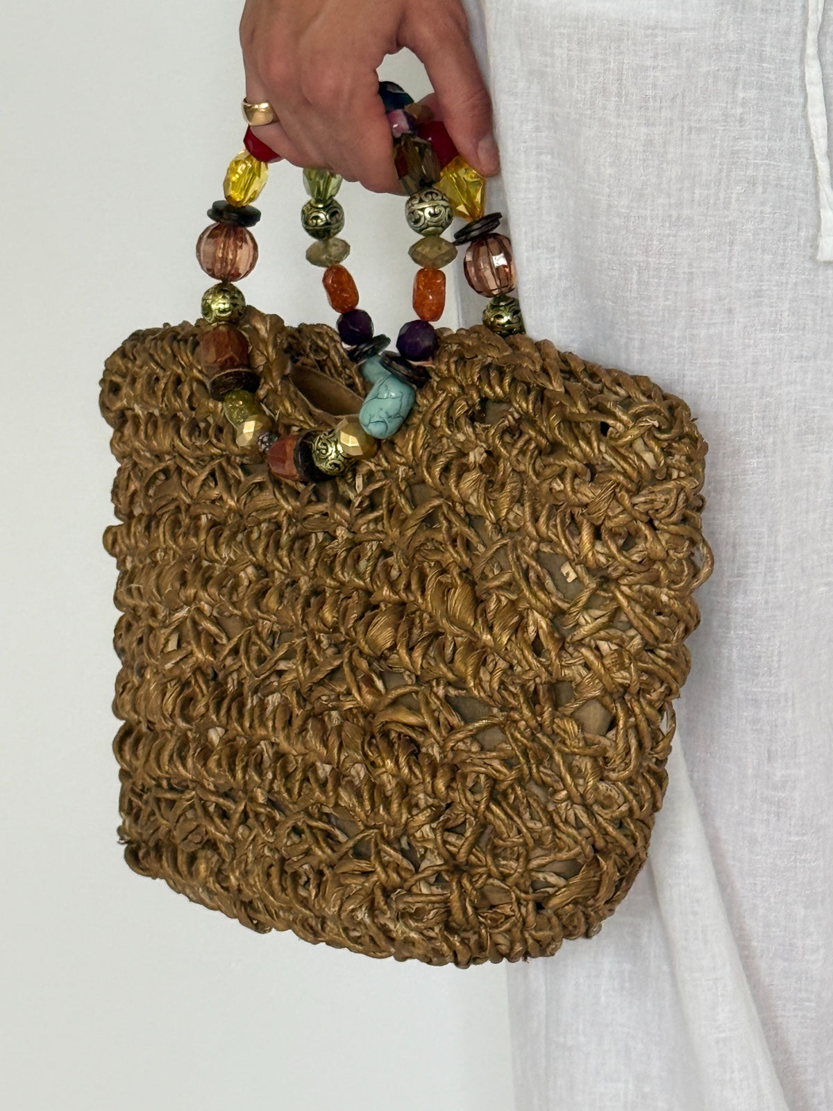 Vintage gold woven handbag with multicolored beaded handles