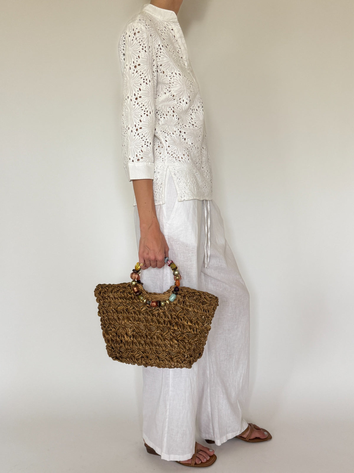 Vintage gold woven handbag with multicolored beaded handles