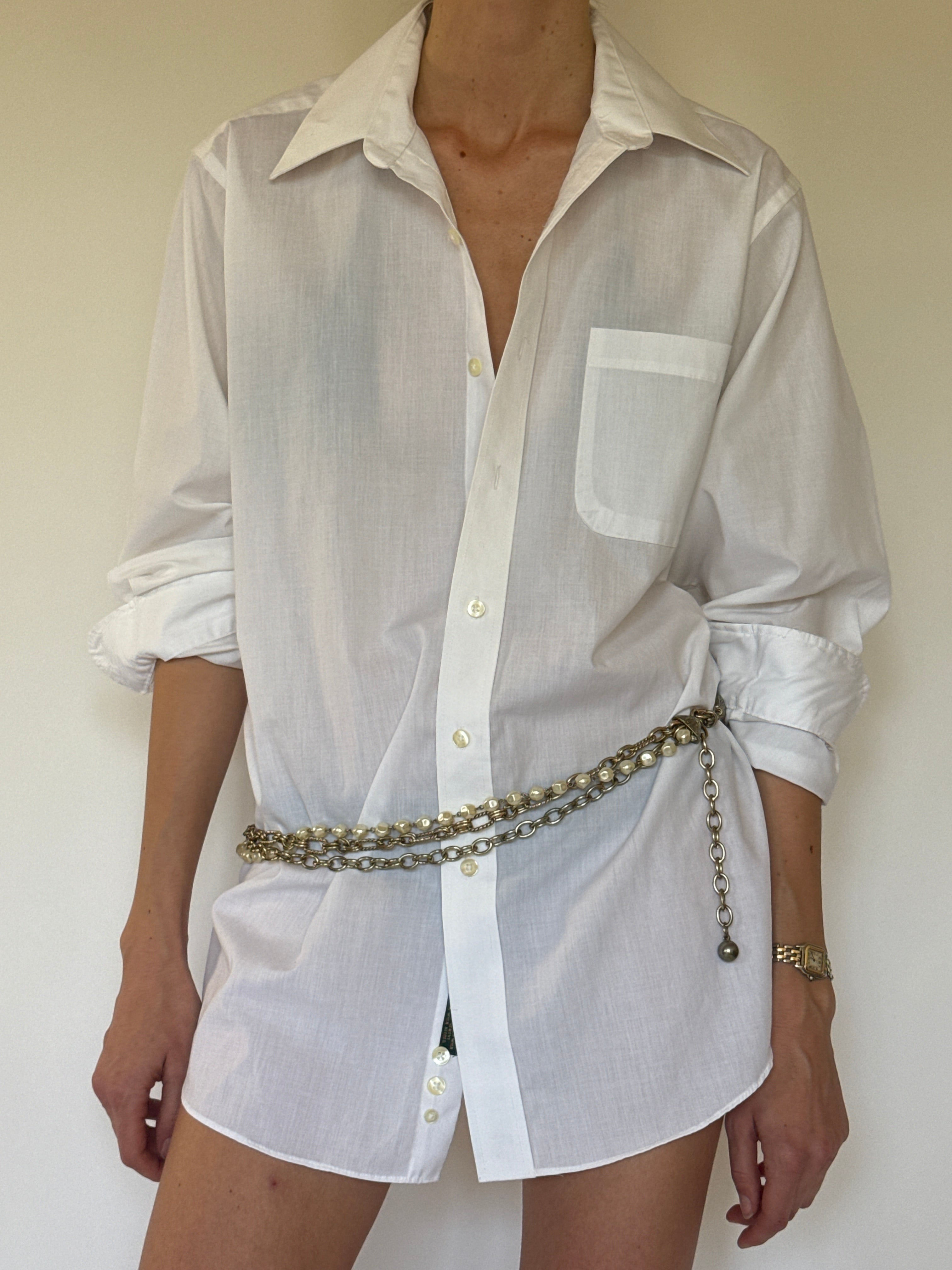 Vintage faux pearl chain belt close-up