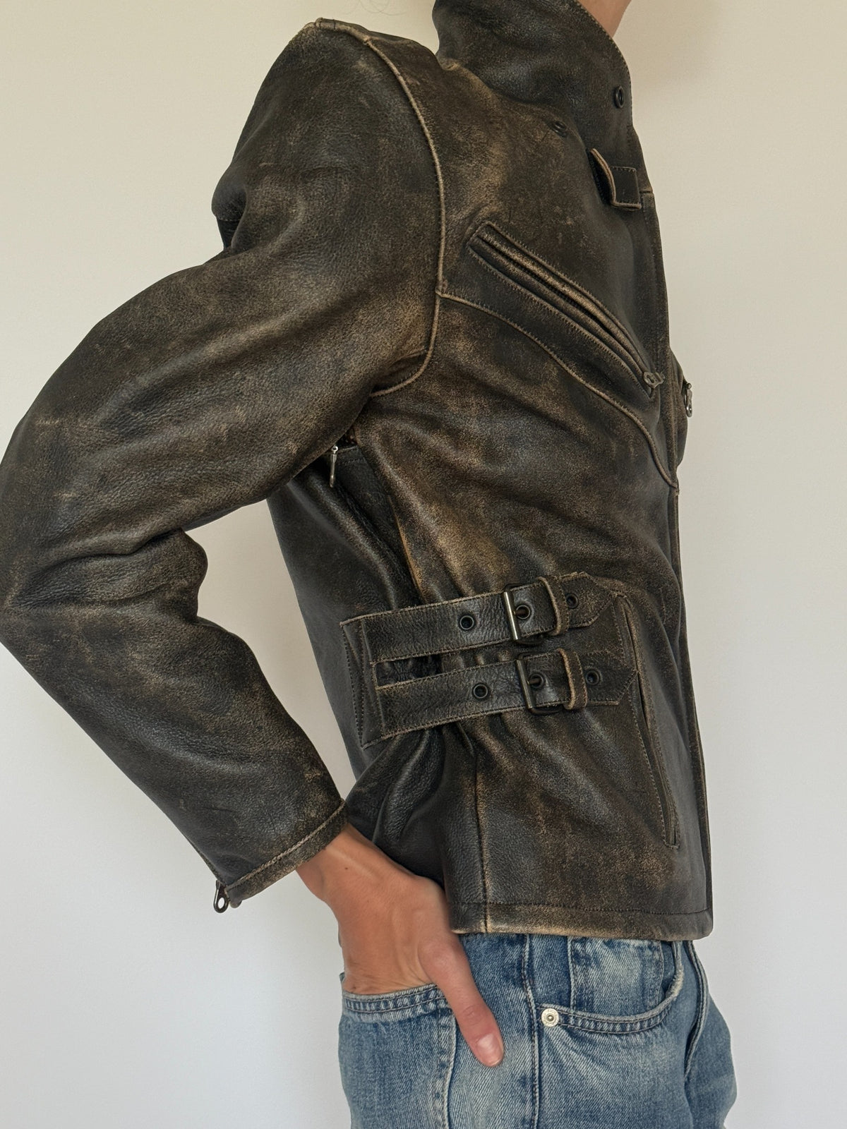 Vintage distressed leather moto jacket side view