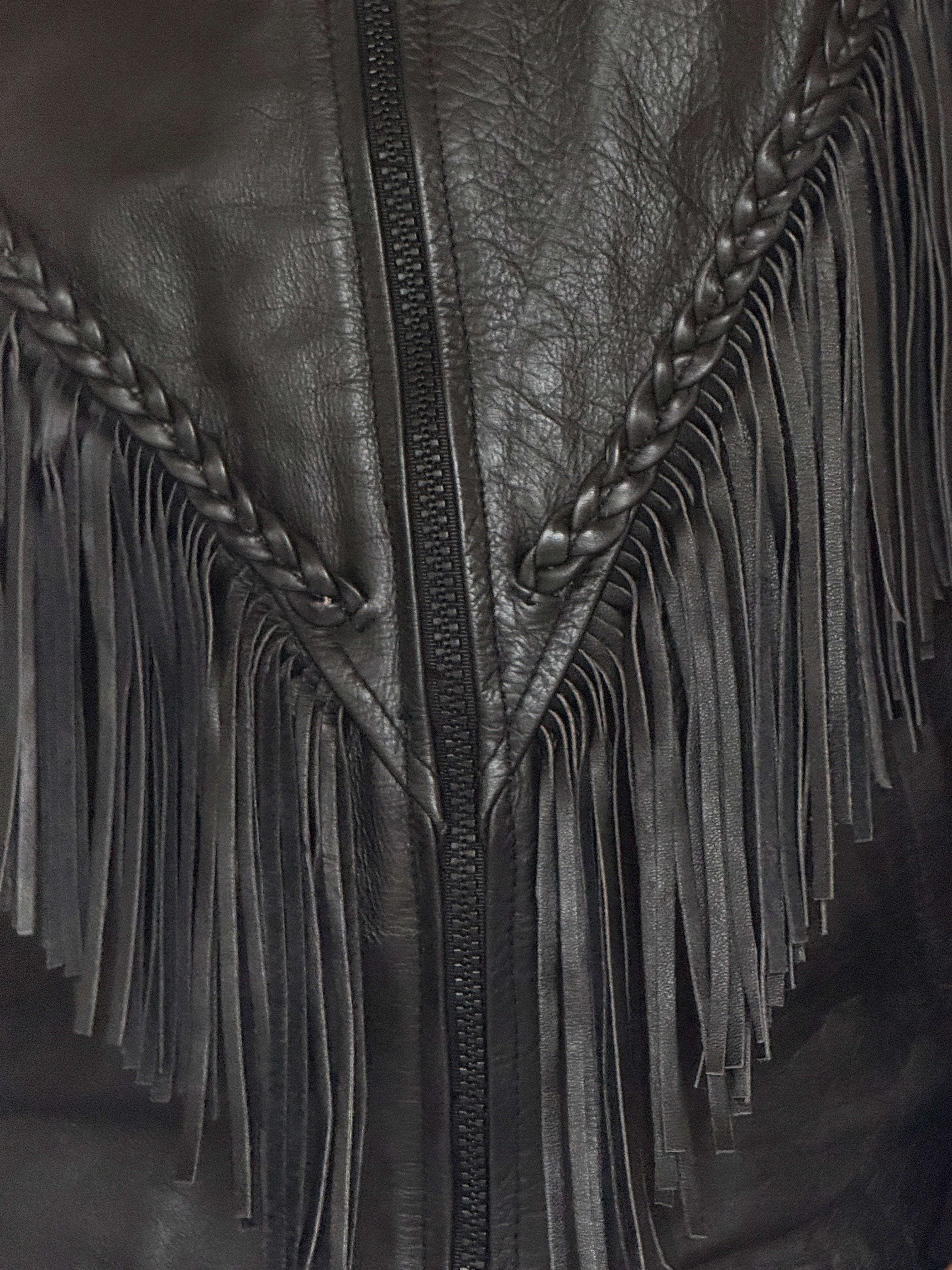 Vintage black motorcycle leather jacket cascading fringe detail