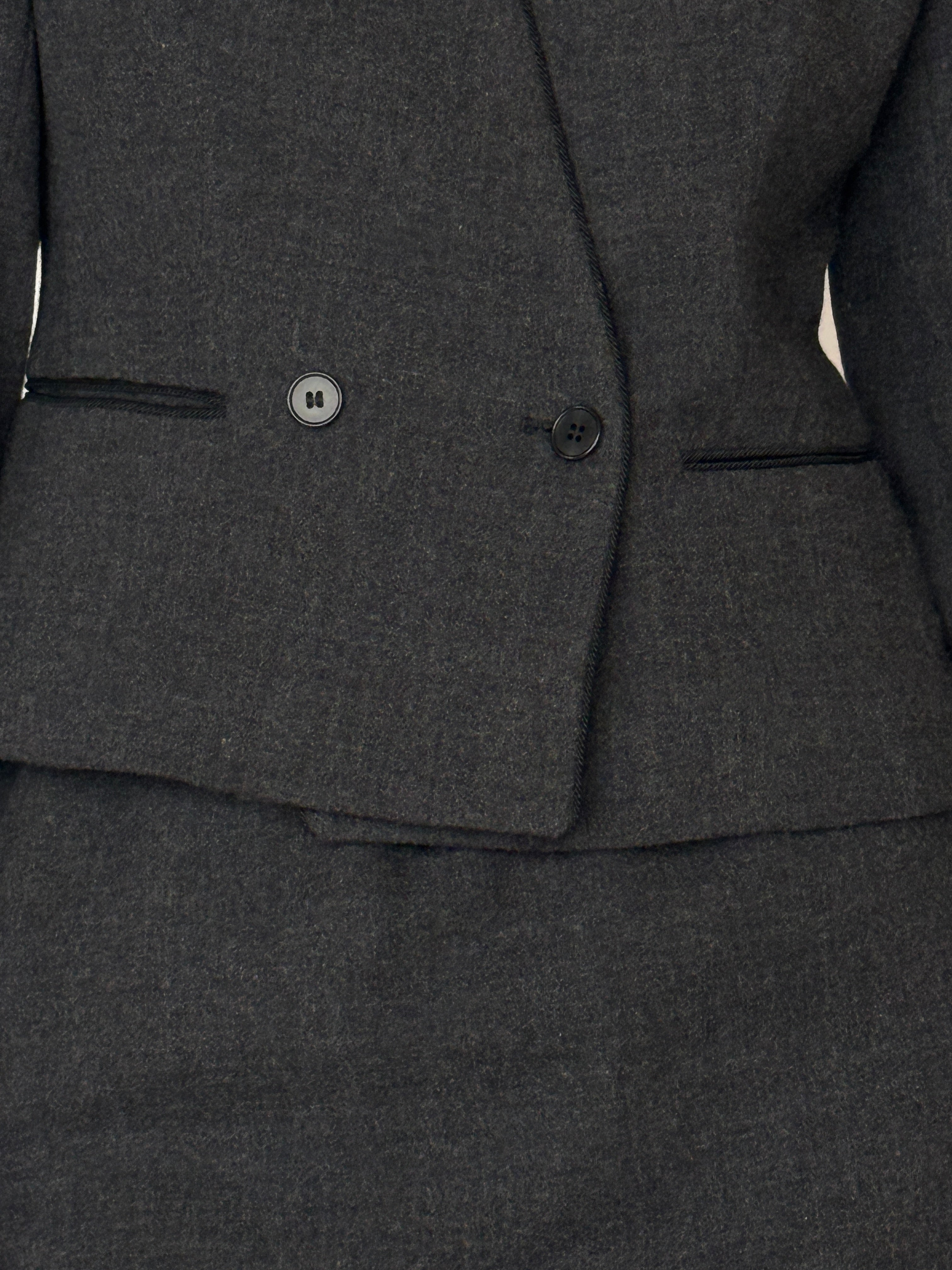 Vintage dark grey wool blazer fabric close-up