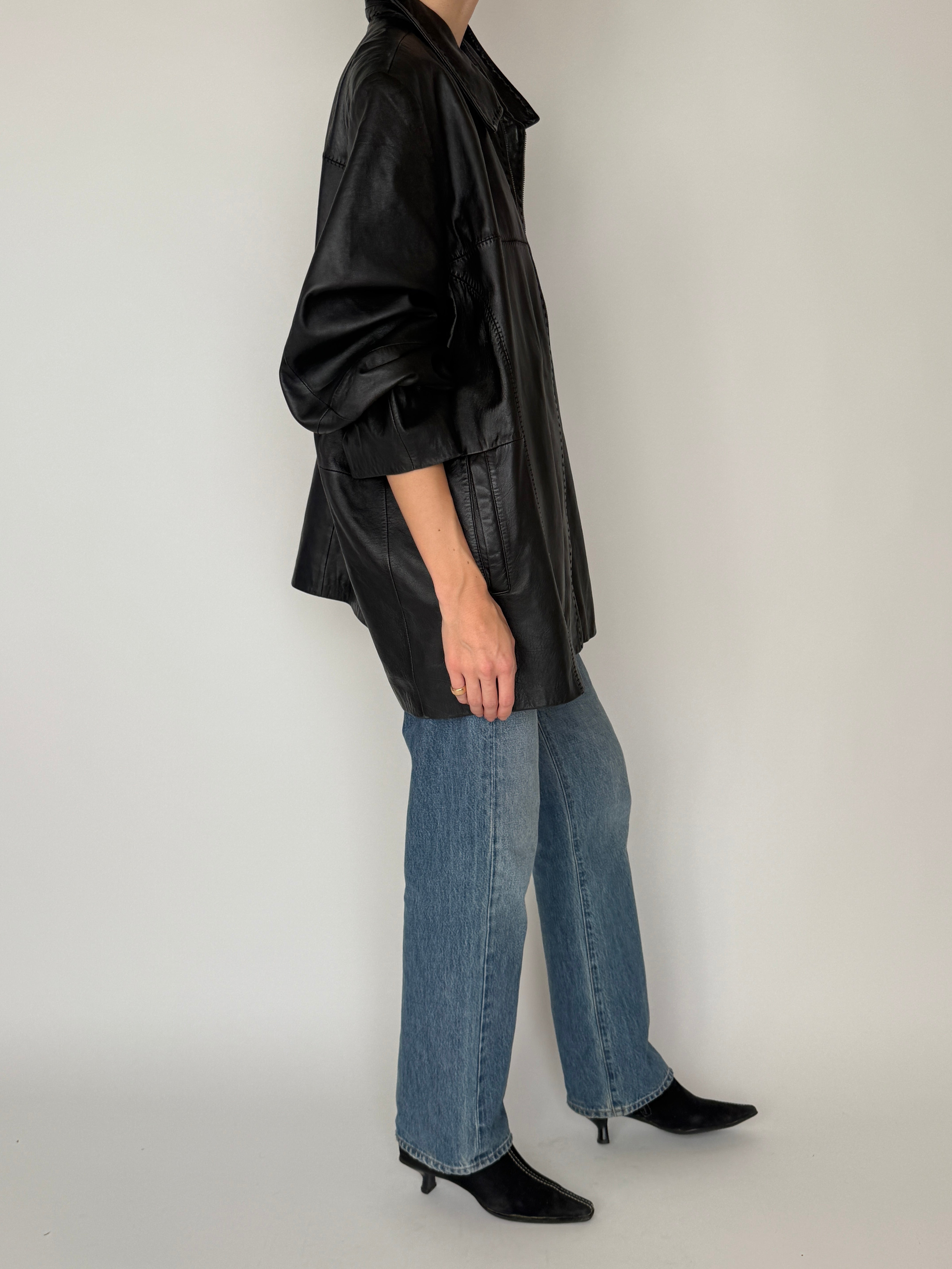 Vintage black oversized leather zip jacket side view