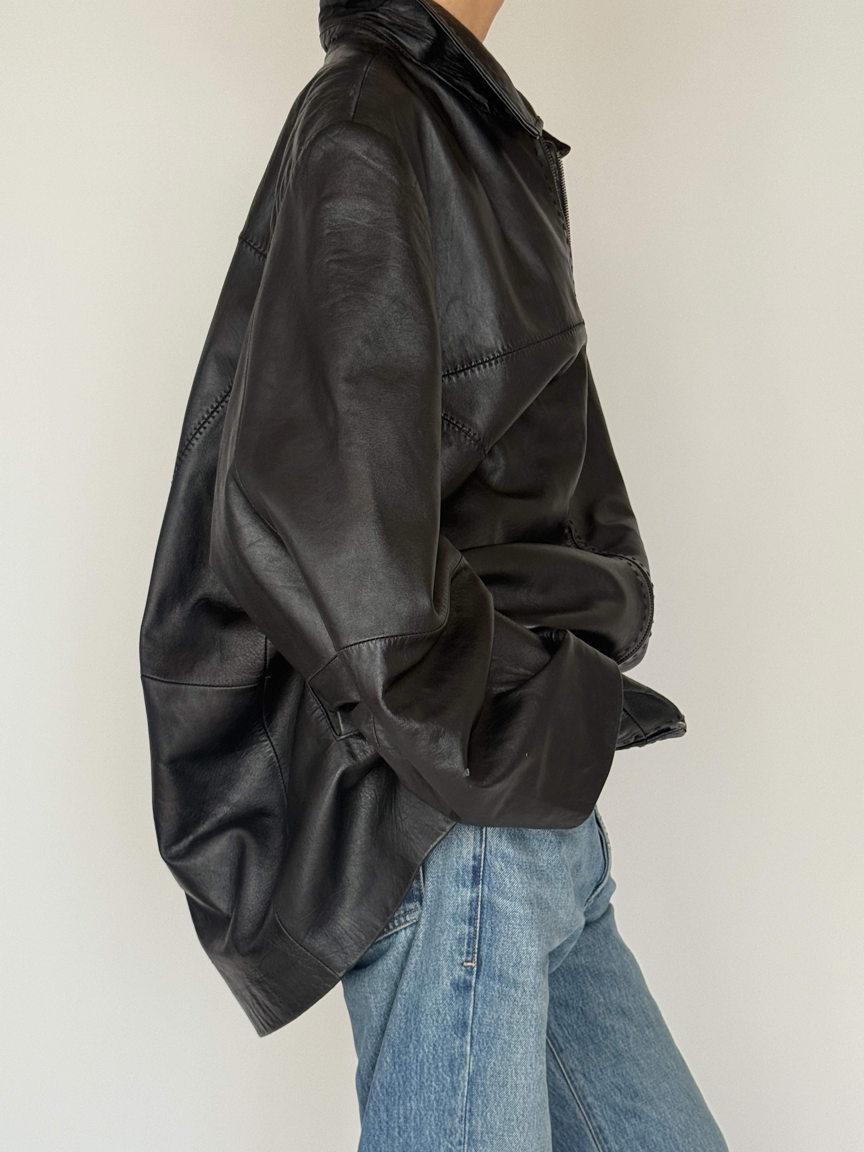 Vintage black oversized leather zip jacket side view