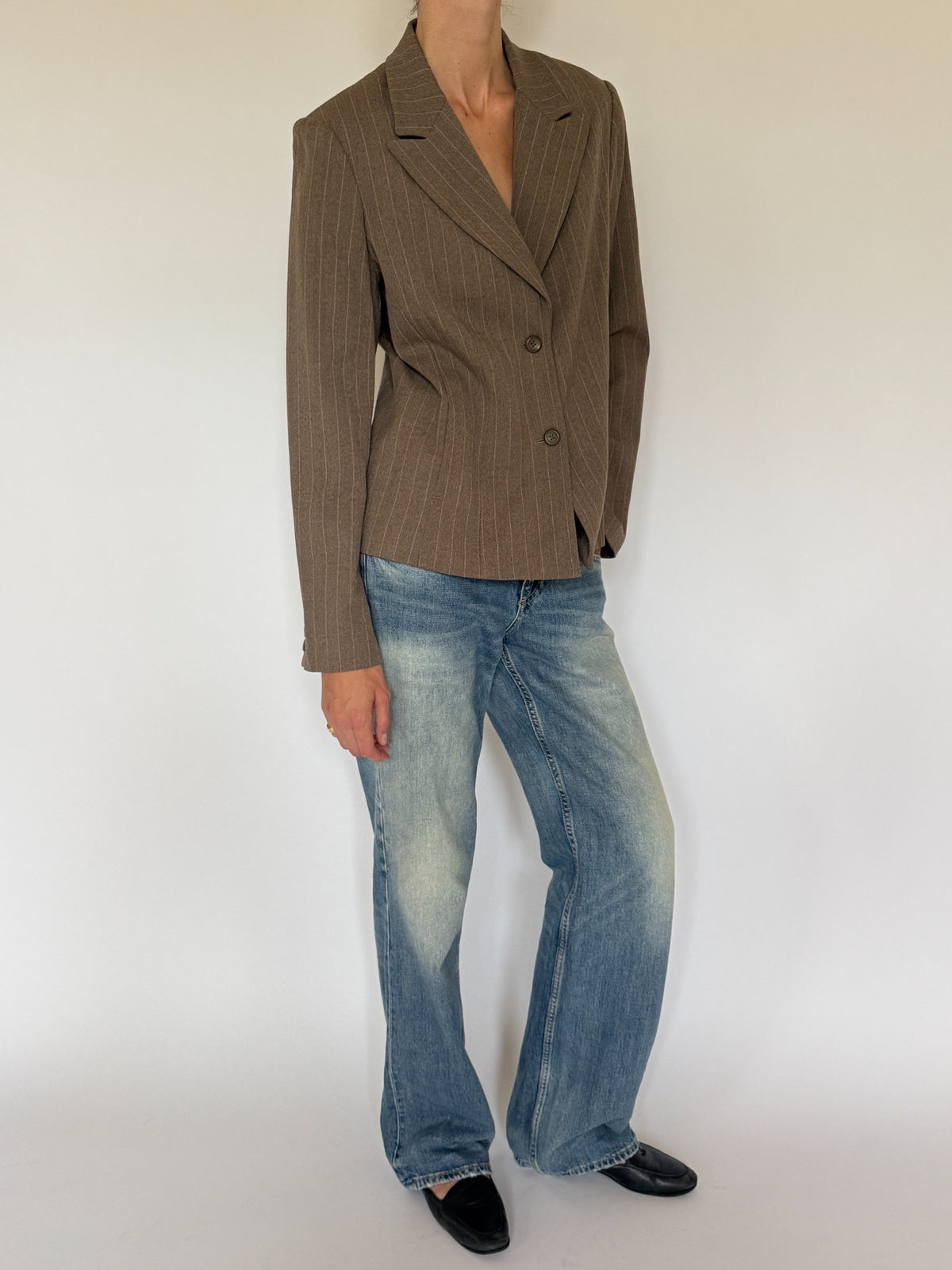 Front view vintage brown pinstripe fitted blazer