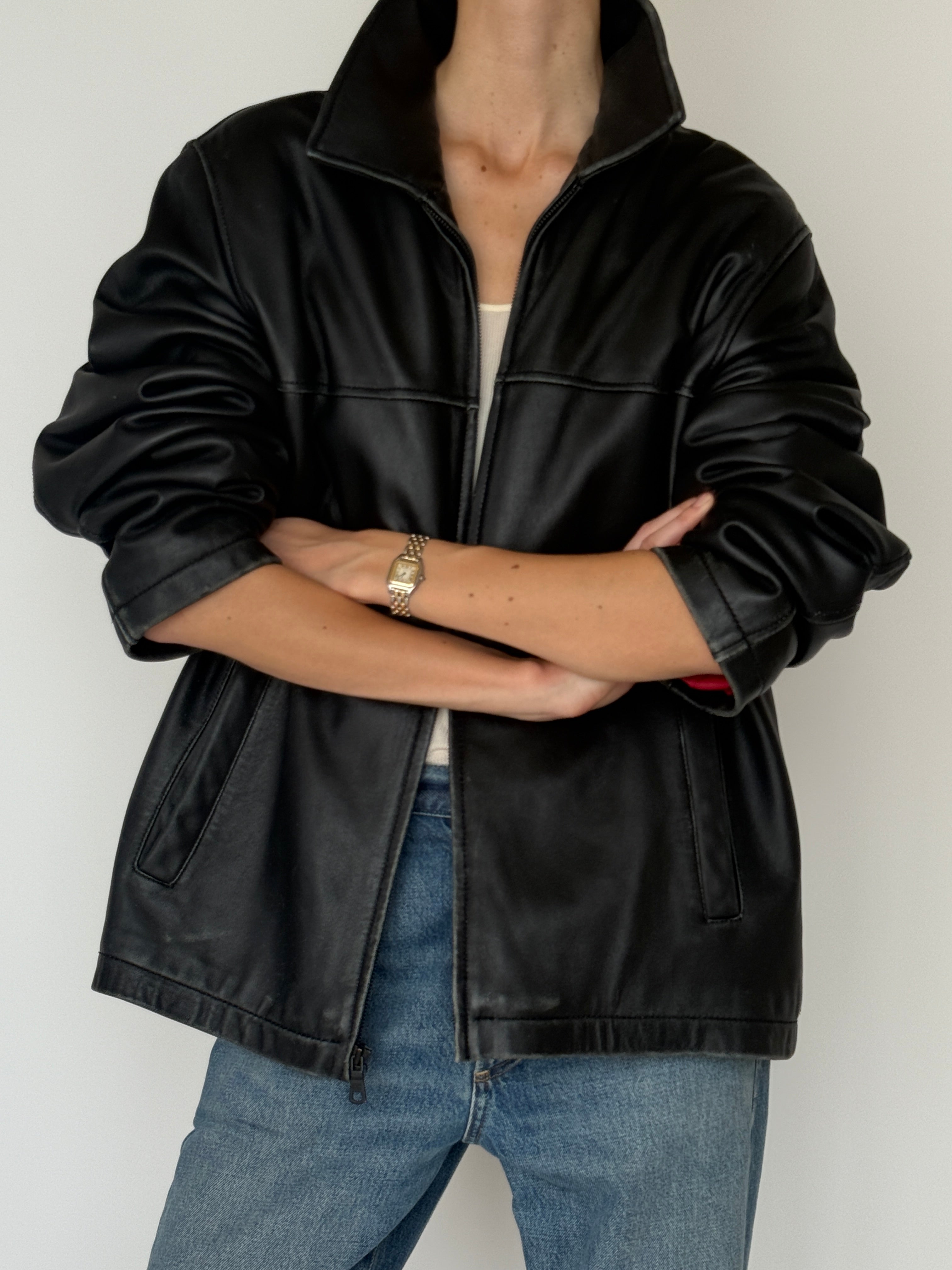 Vintage Tommy Hilfiger black leather zip jacket leather texture close-up