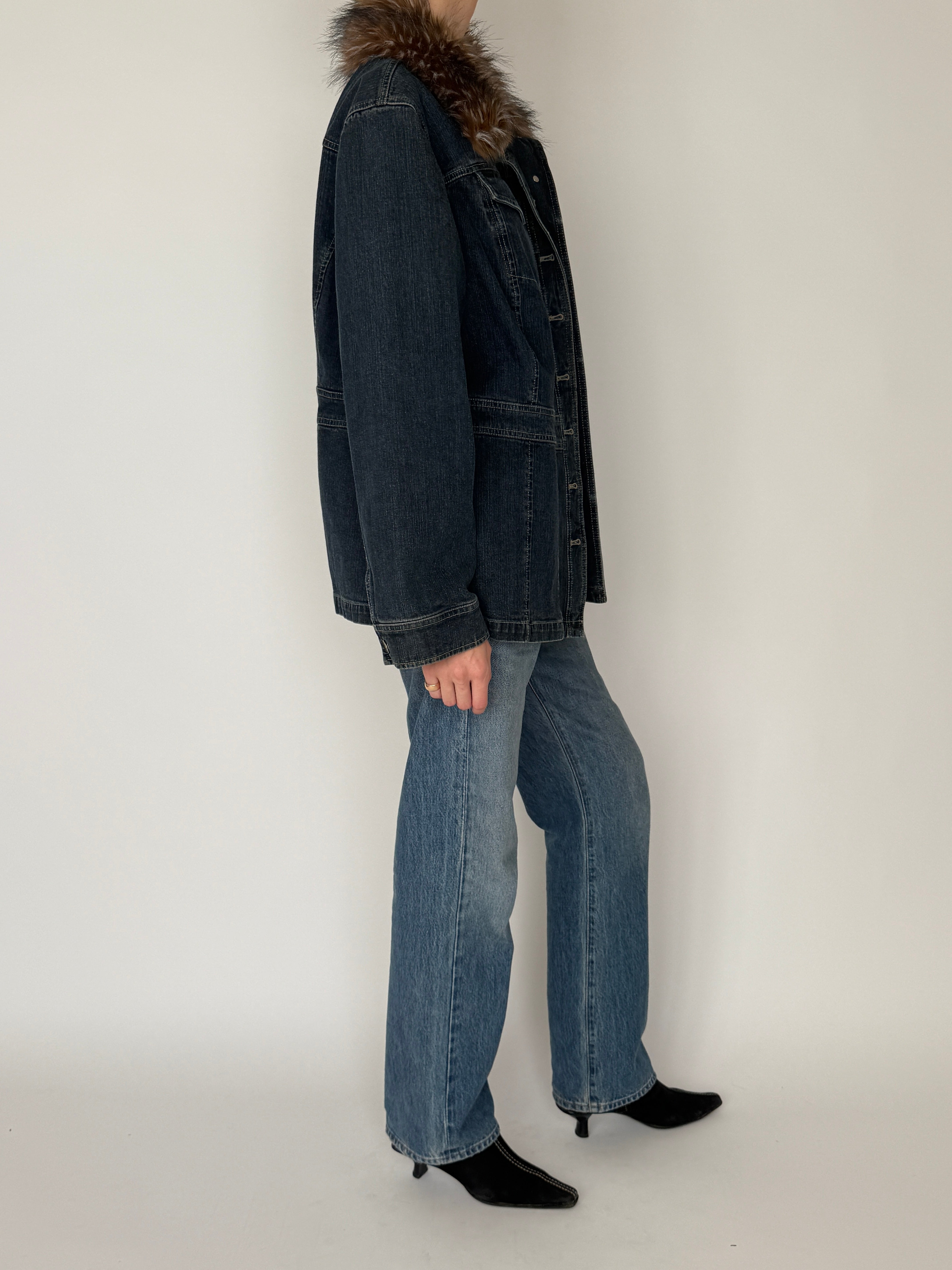 Vintage blue denim jacket side view