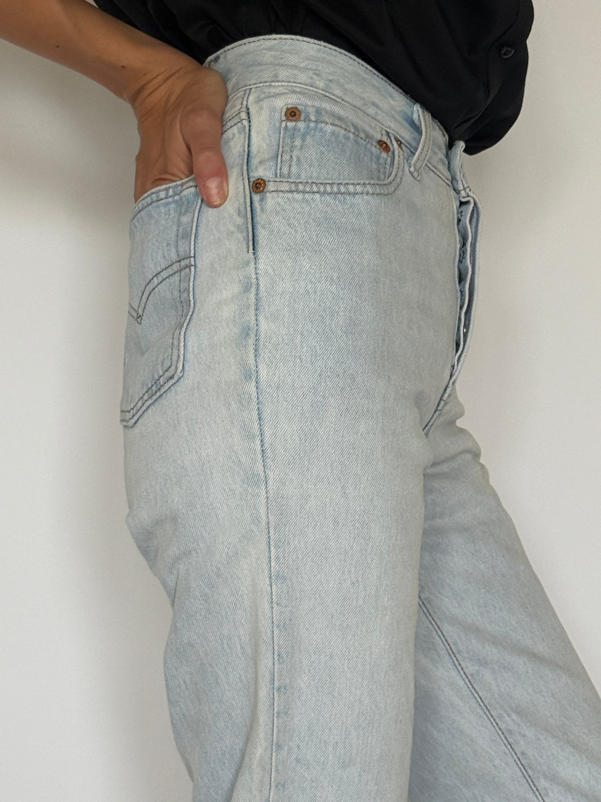 Vintage Levi’s high-rise light blue jeans side view