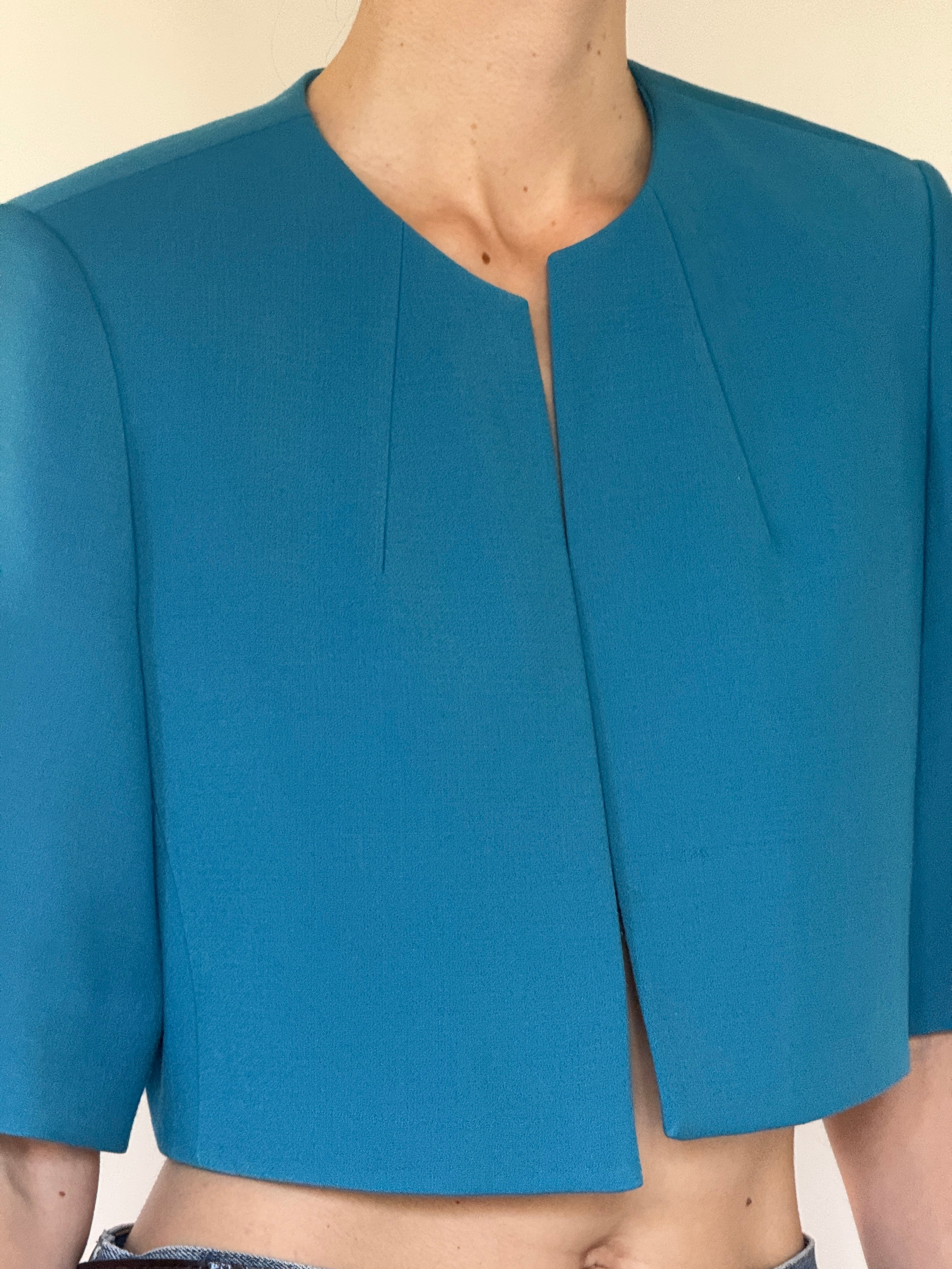 Vintage Calvin Klein teal cropped stretch jacket hemline cropped length detail