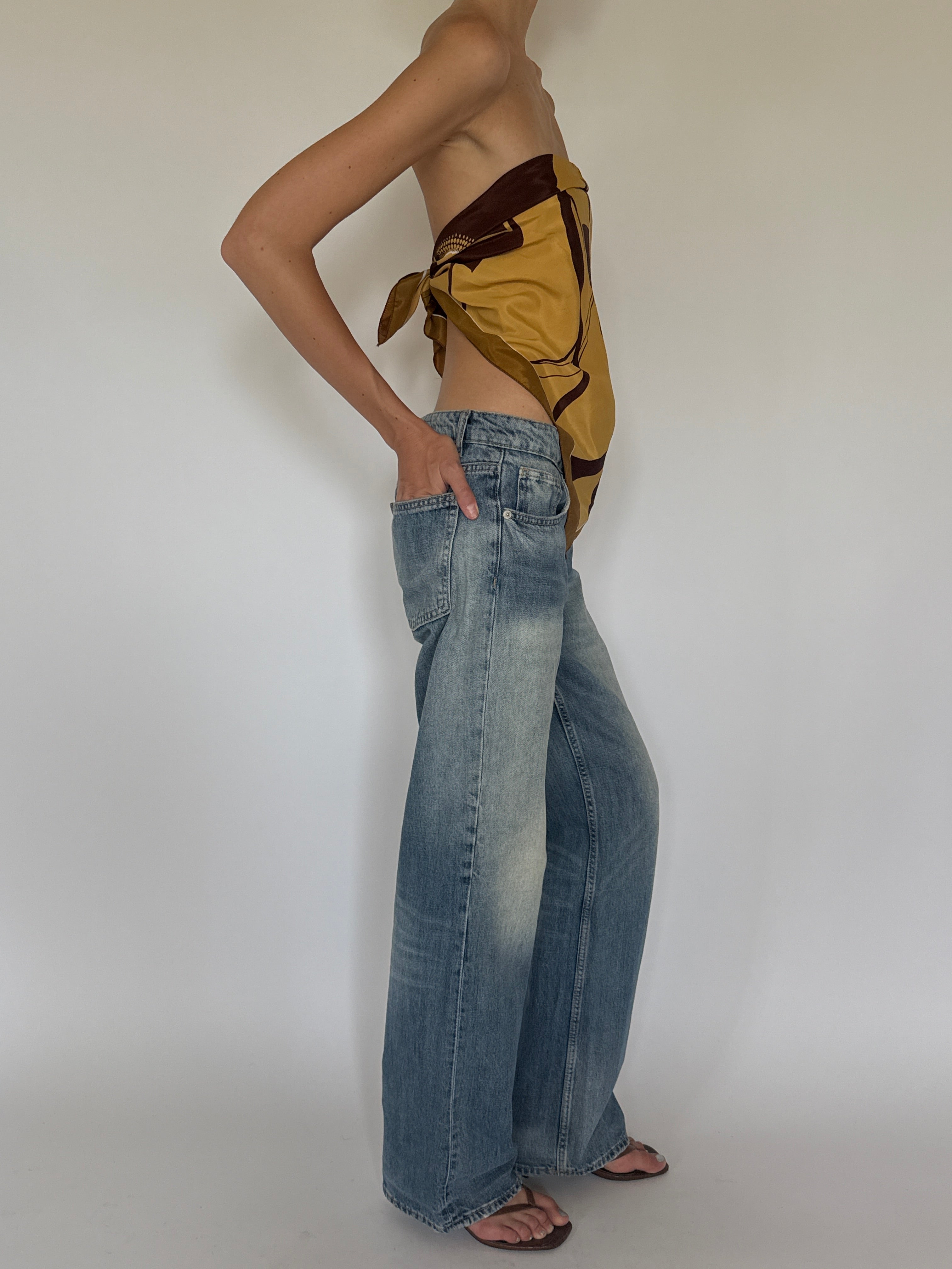 Vintage mustard floral scarf styled as a top side view