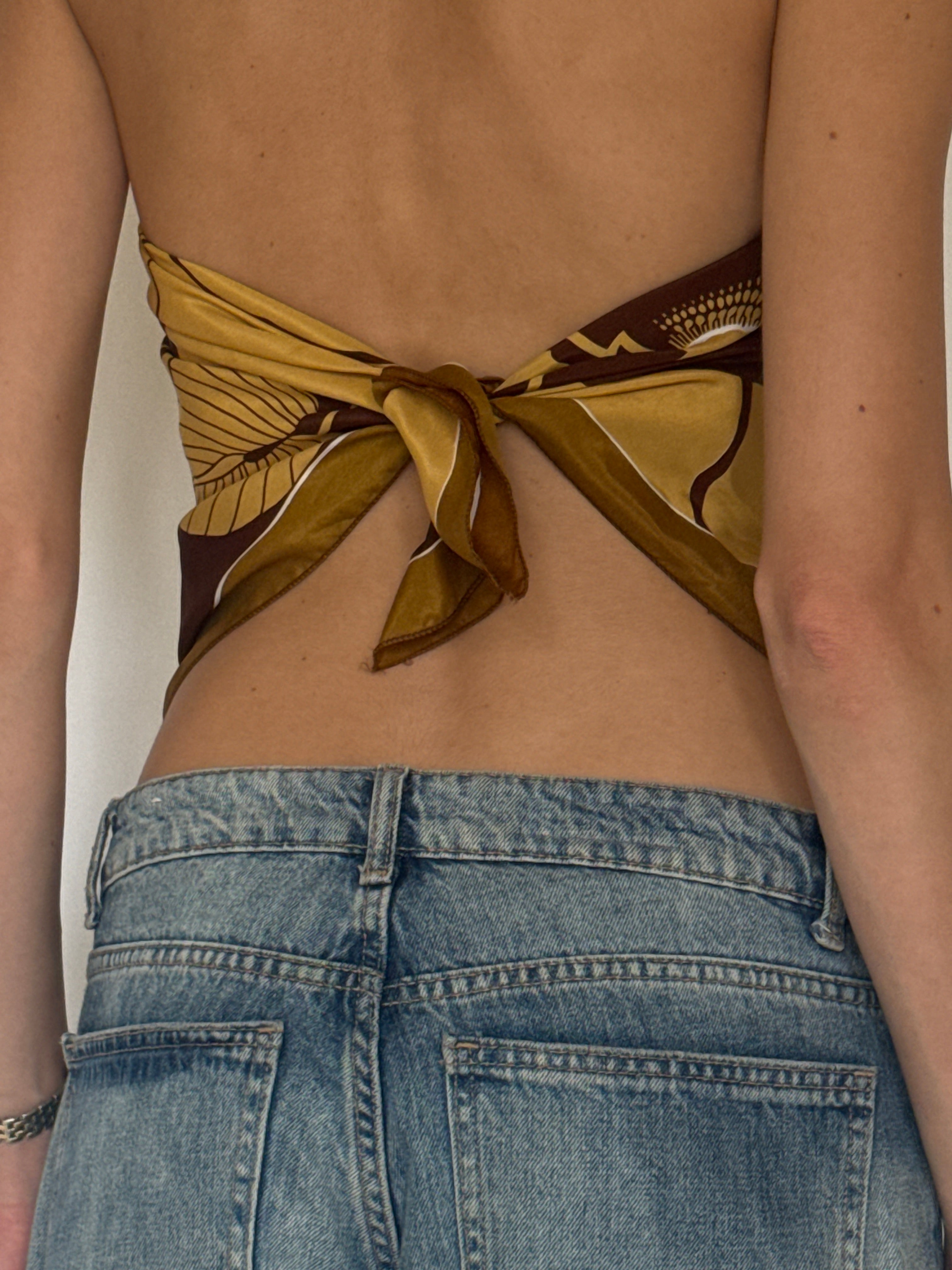 Vintage mustard floral scarf styled as a top back view