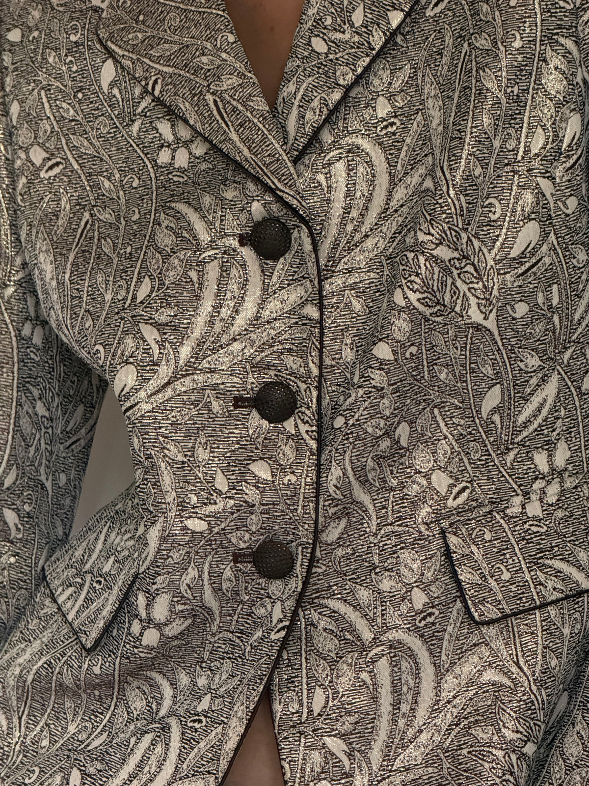 Vintage ivory and brown botanical jacquard fabric close-up