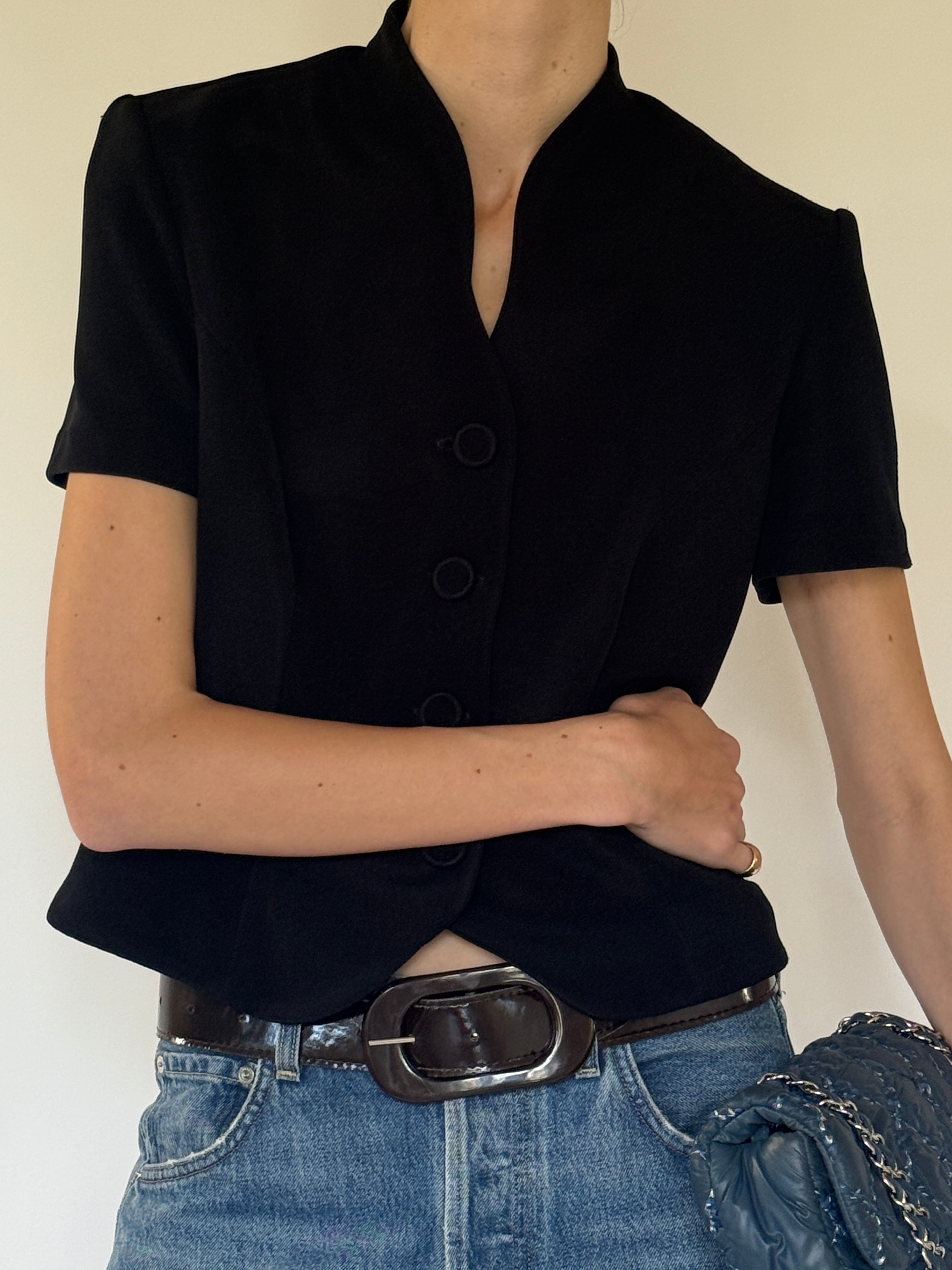 Vintage structured black top close-up detail