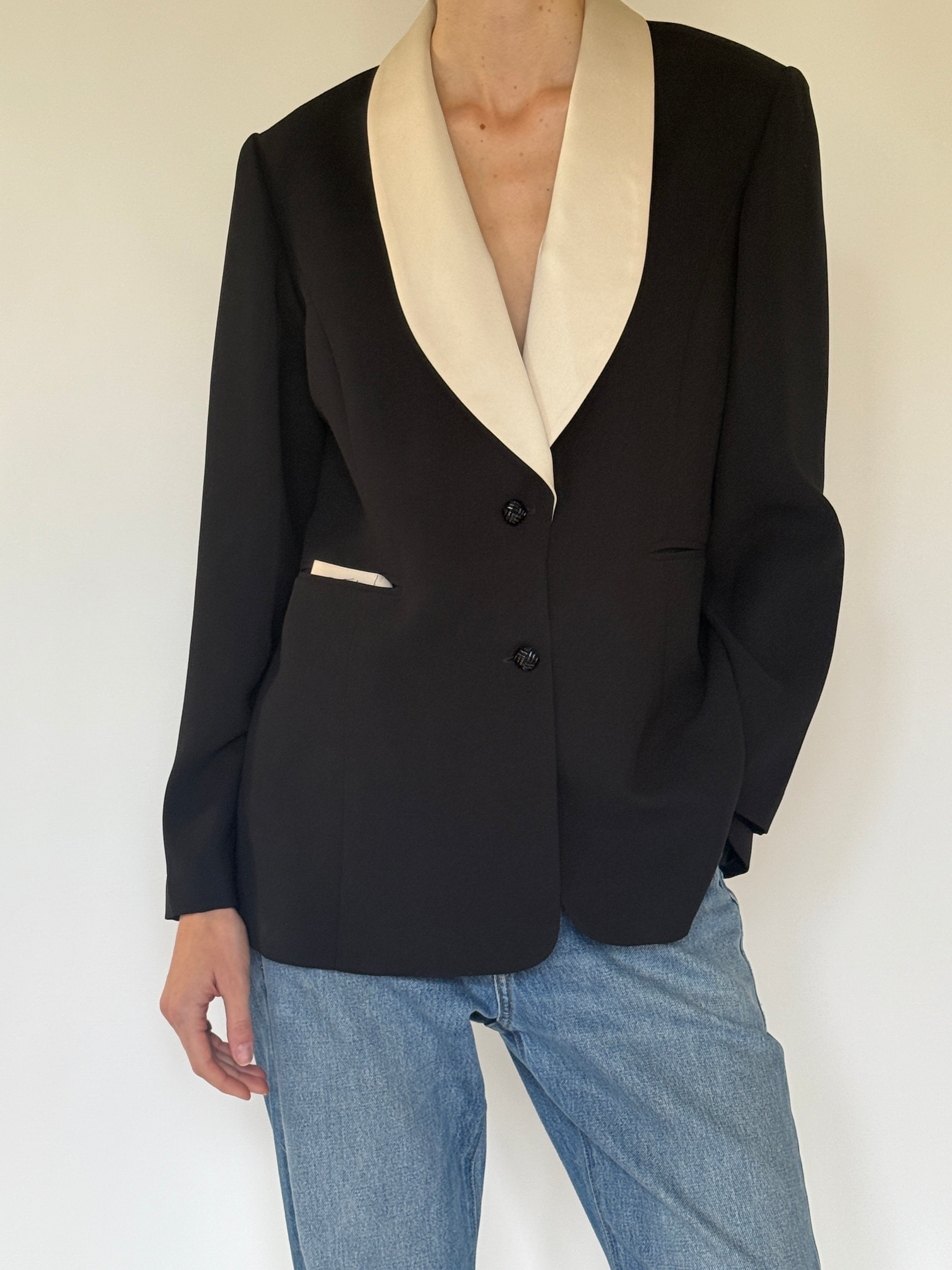 Vintage black blazer close-up of shawl collar