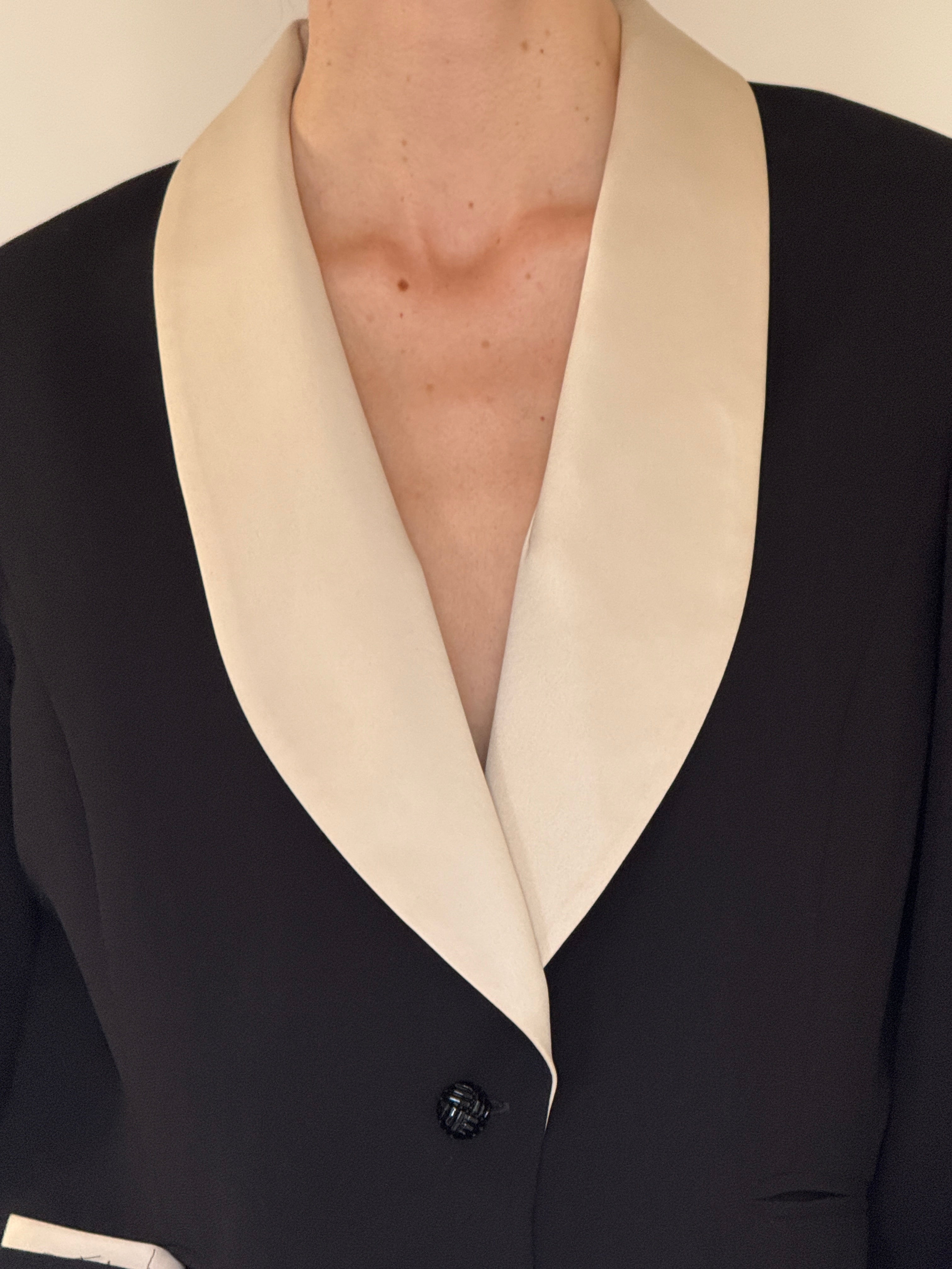 Vintage black blazer close-up of shawl collar
