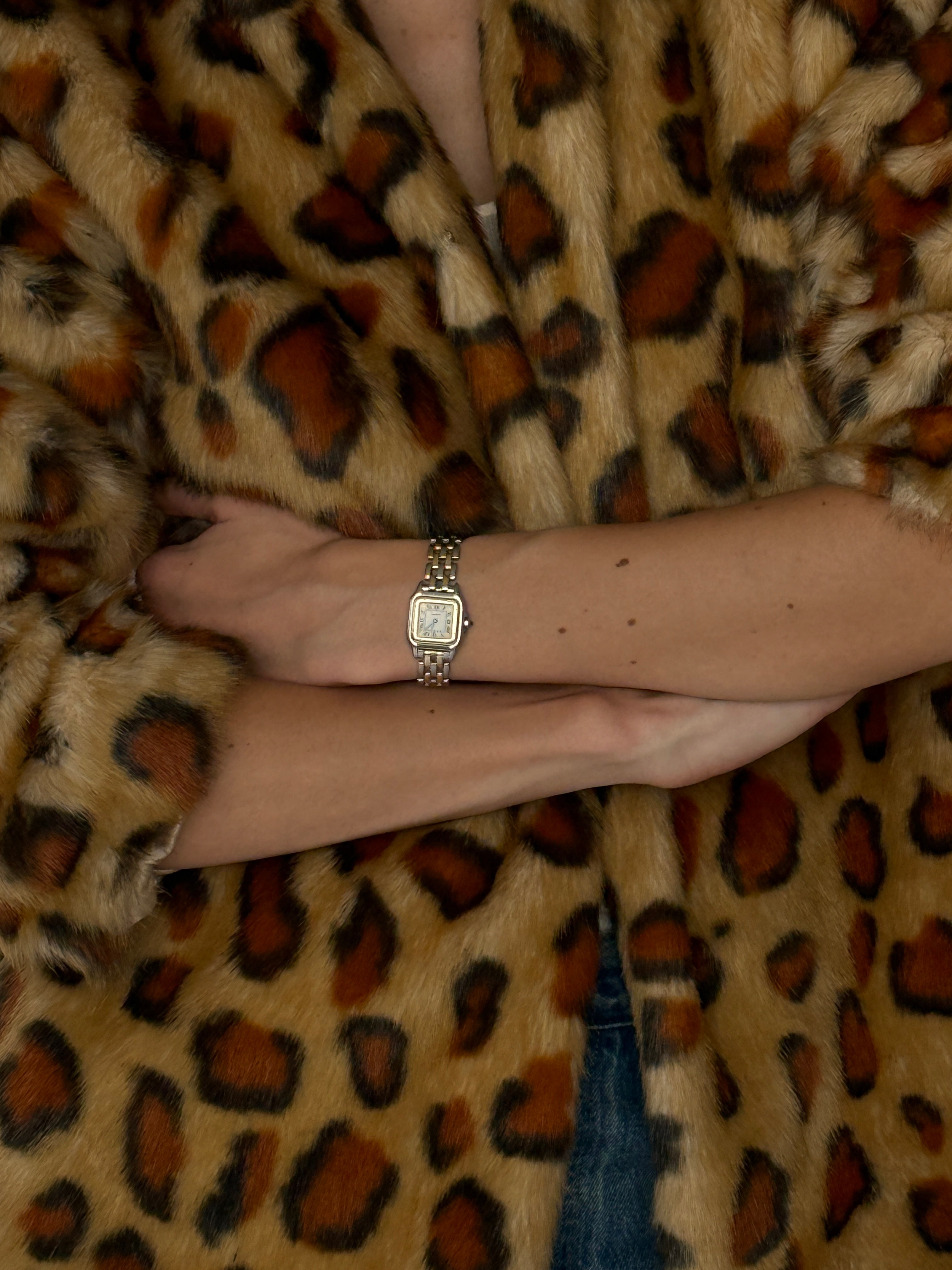 Vintage leopard faux fur jacket texture close up