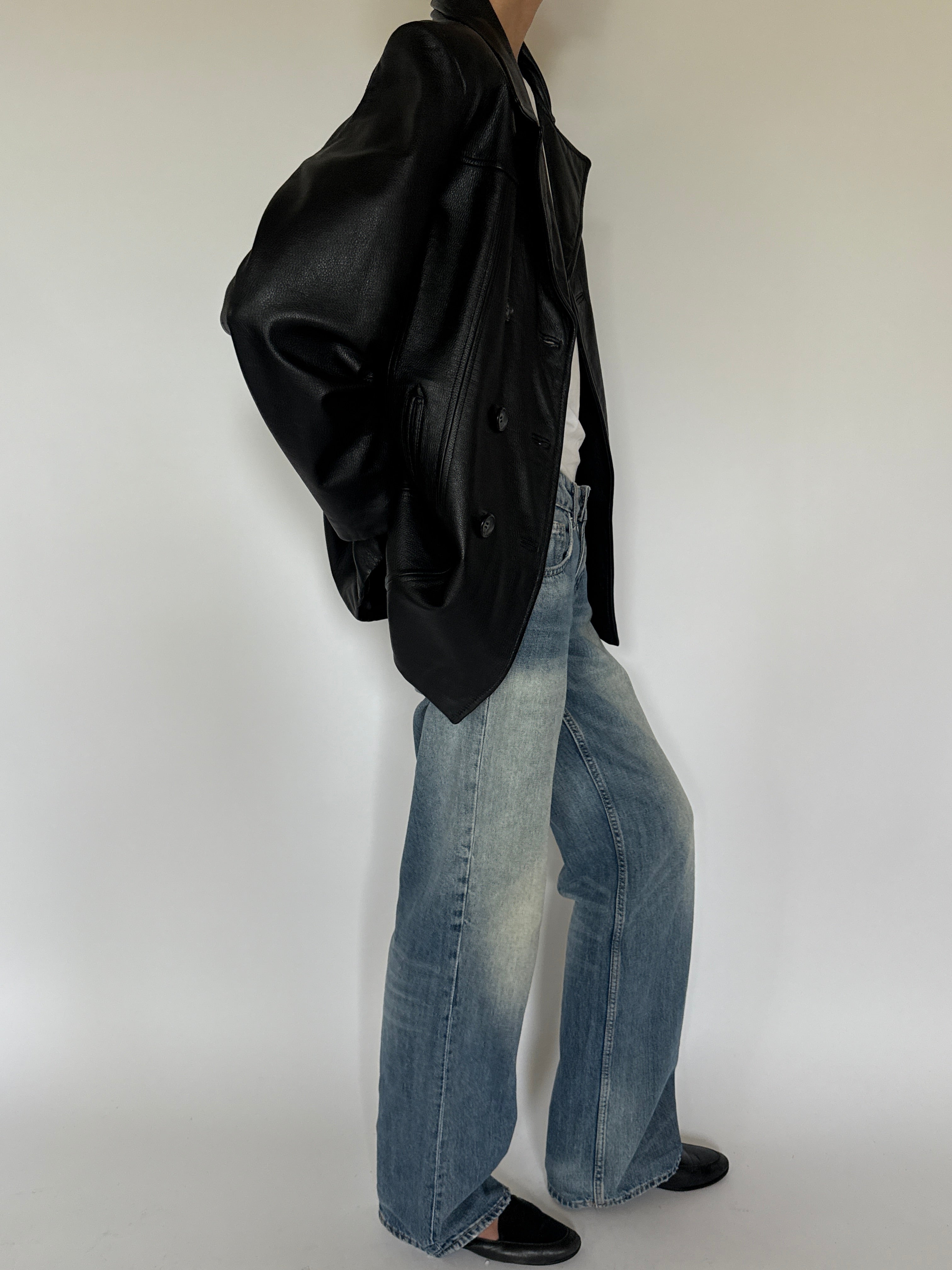 Vintage black leather blazer side view