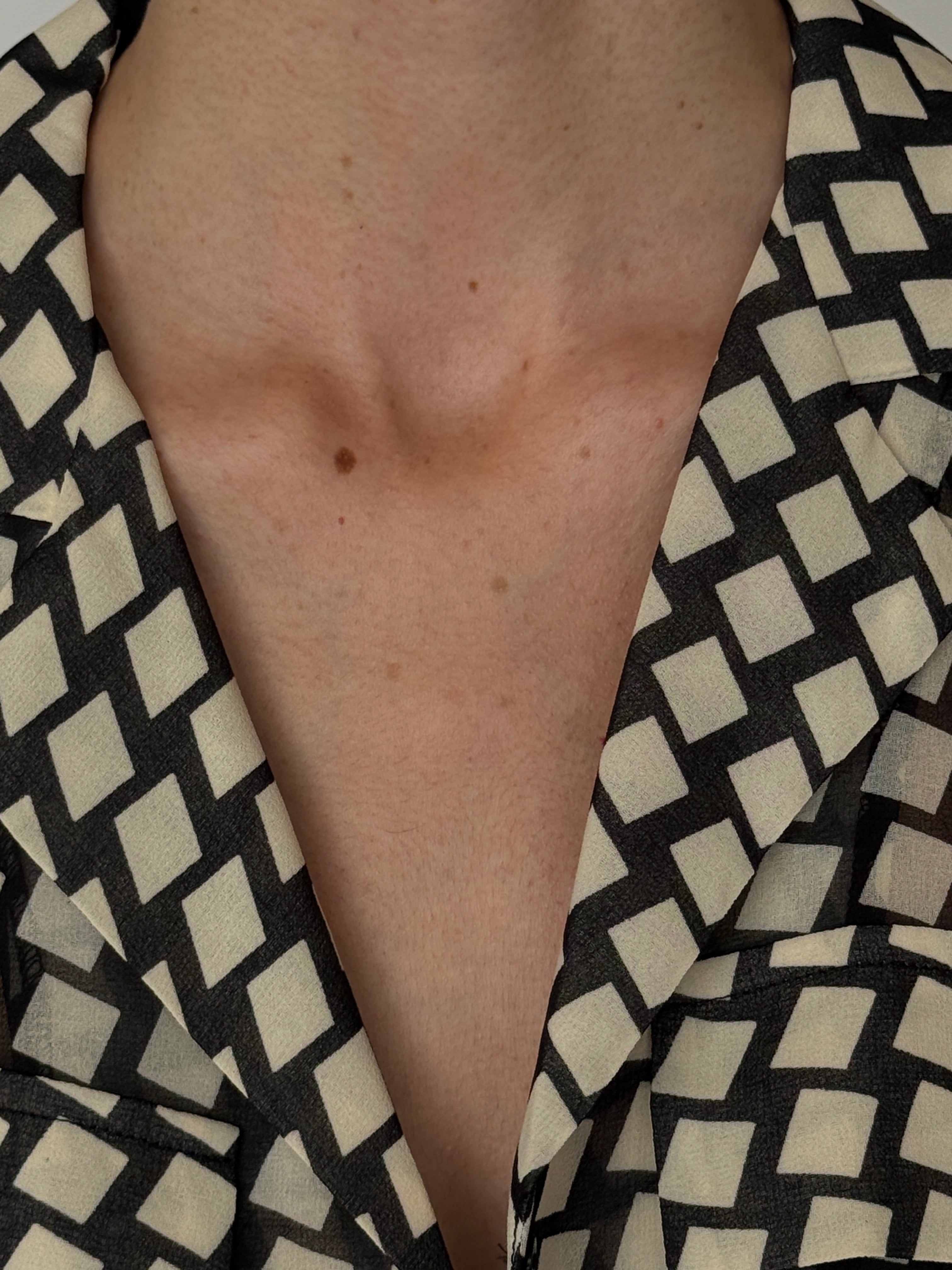 Vintage black and cream geometric sheer blouse collar detail