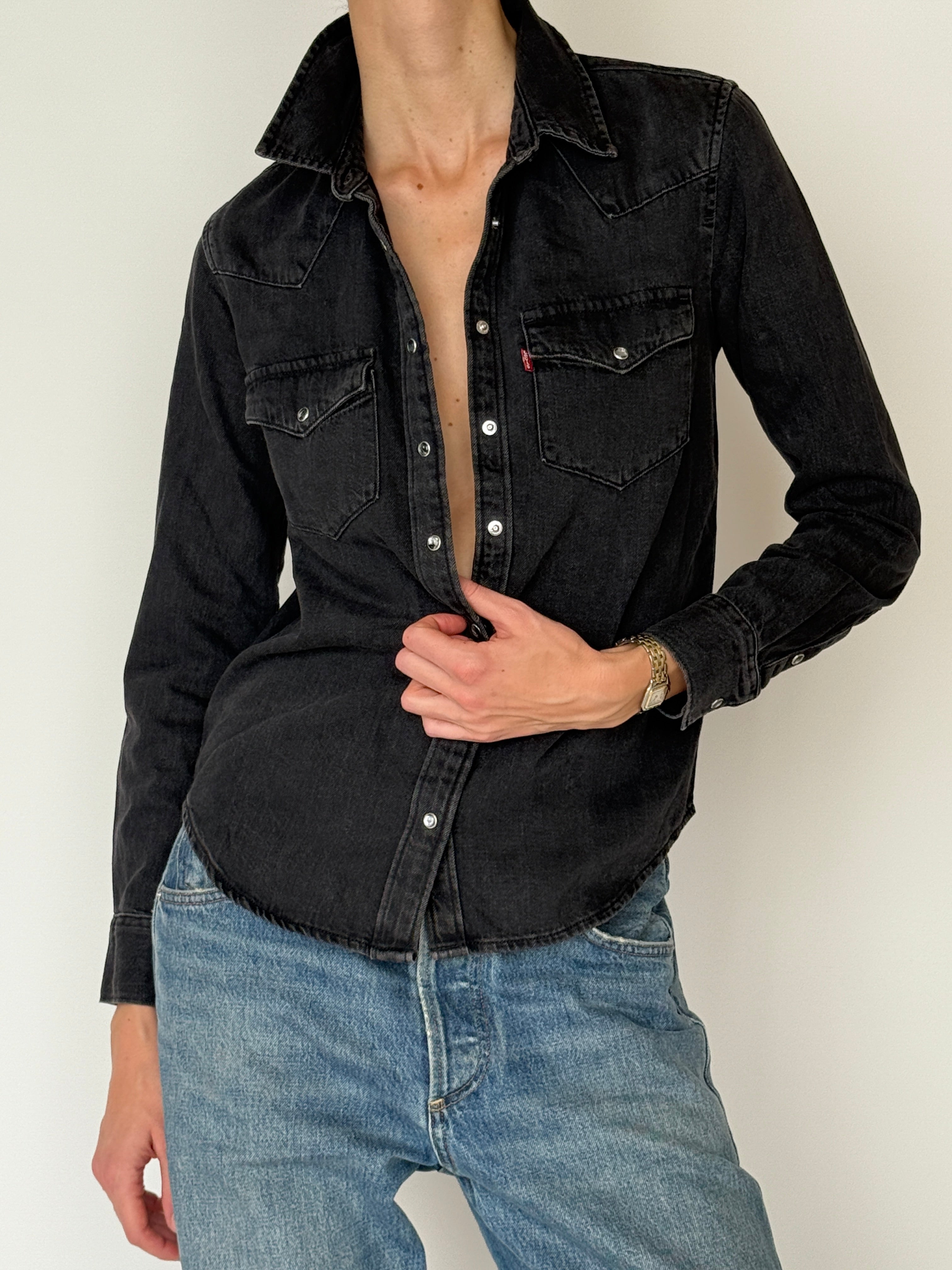 Vintage Levi’s faded black denim shirt chest pocket detail