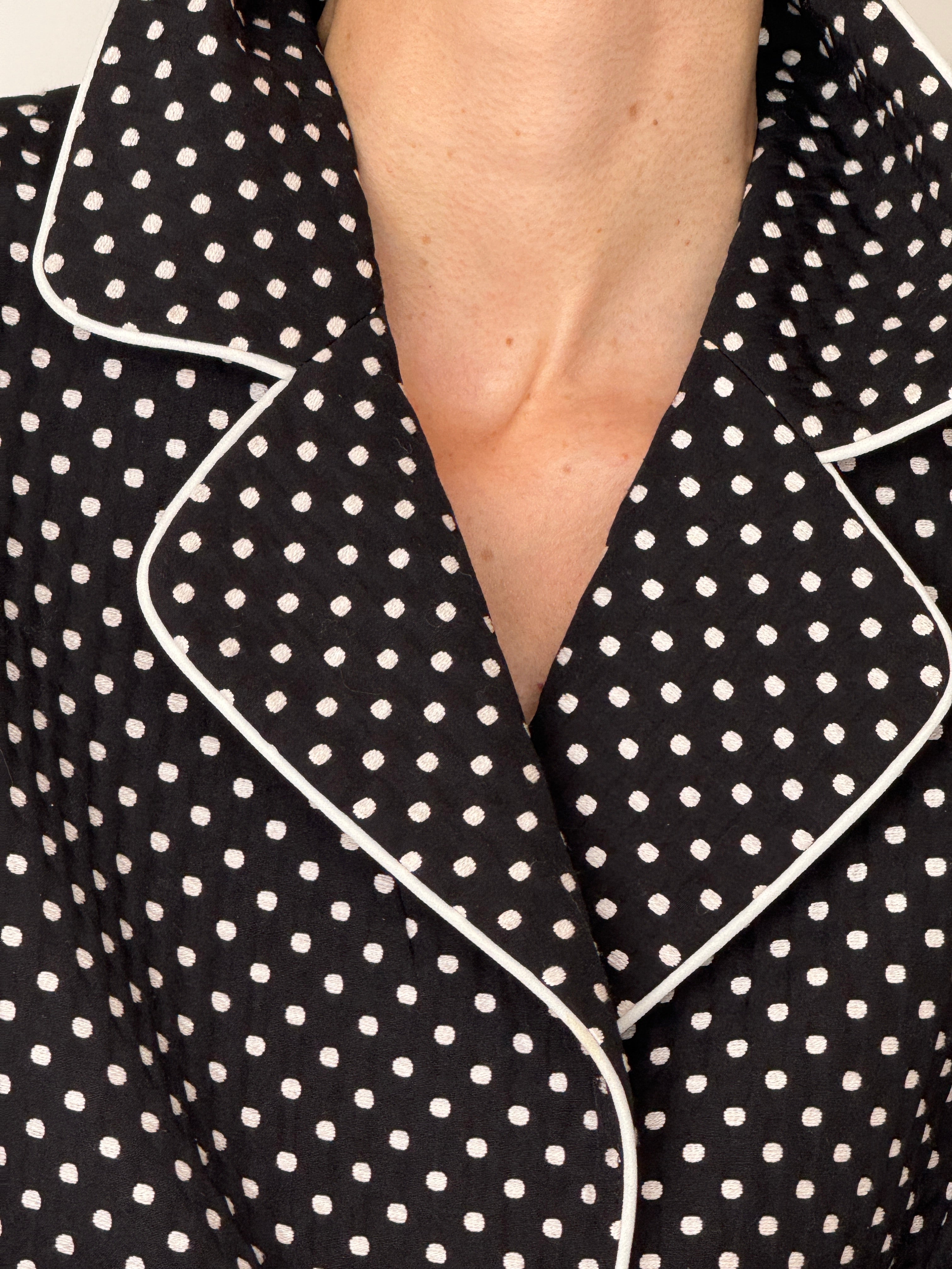 Vintage black polka dot blazer lapel piping detail