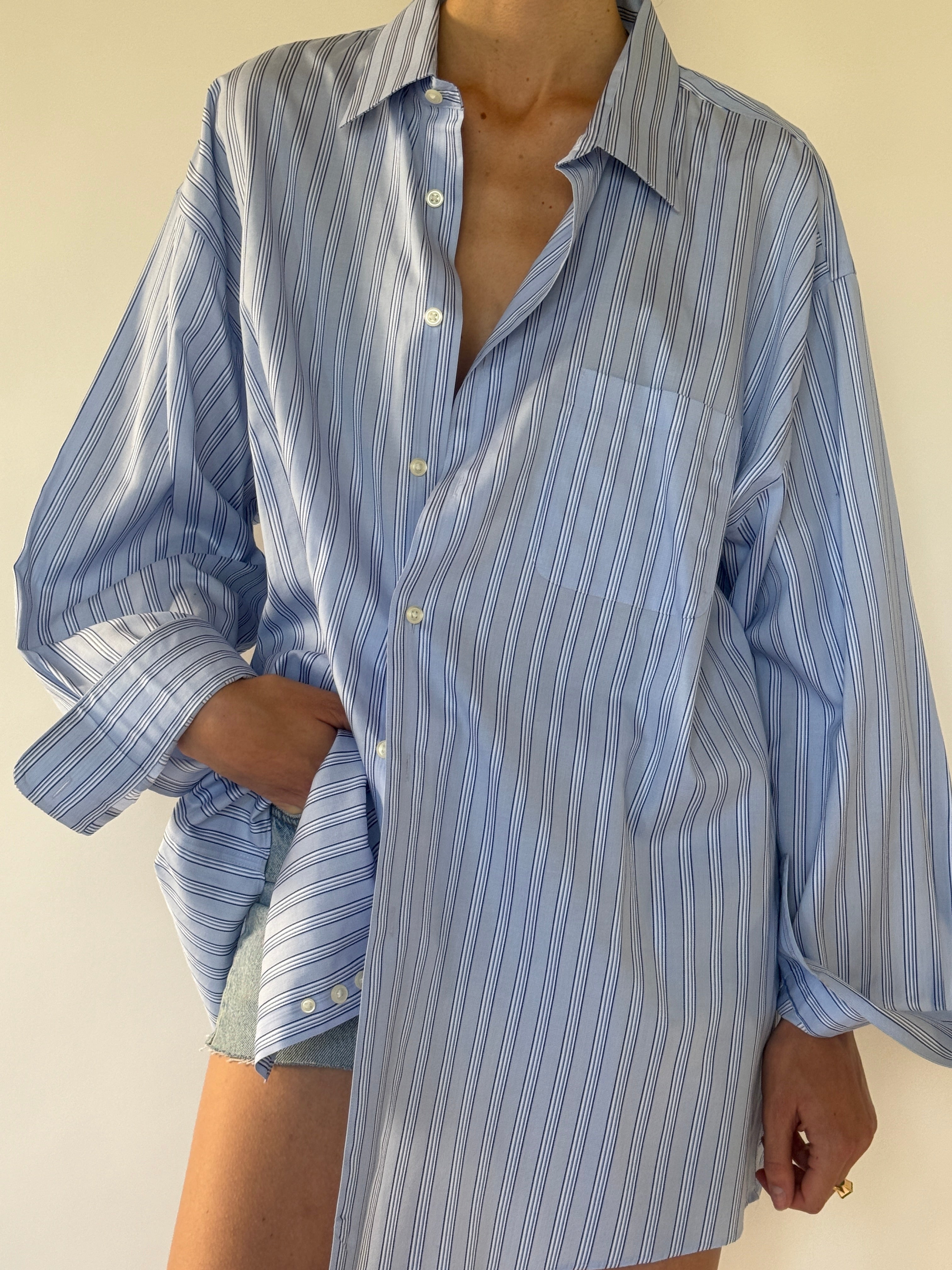 Vintage oversized blue striped button-up shirt front view