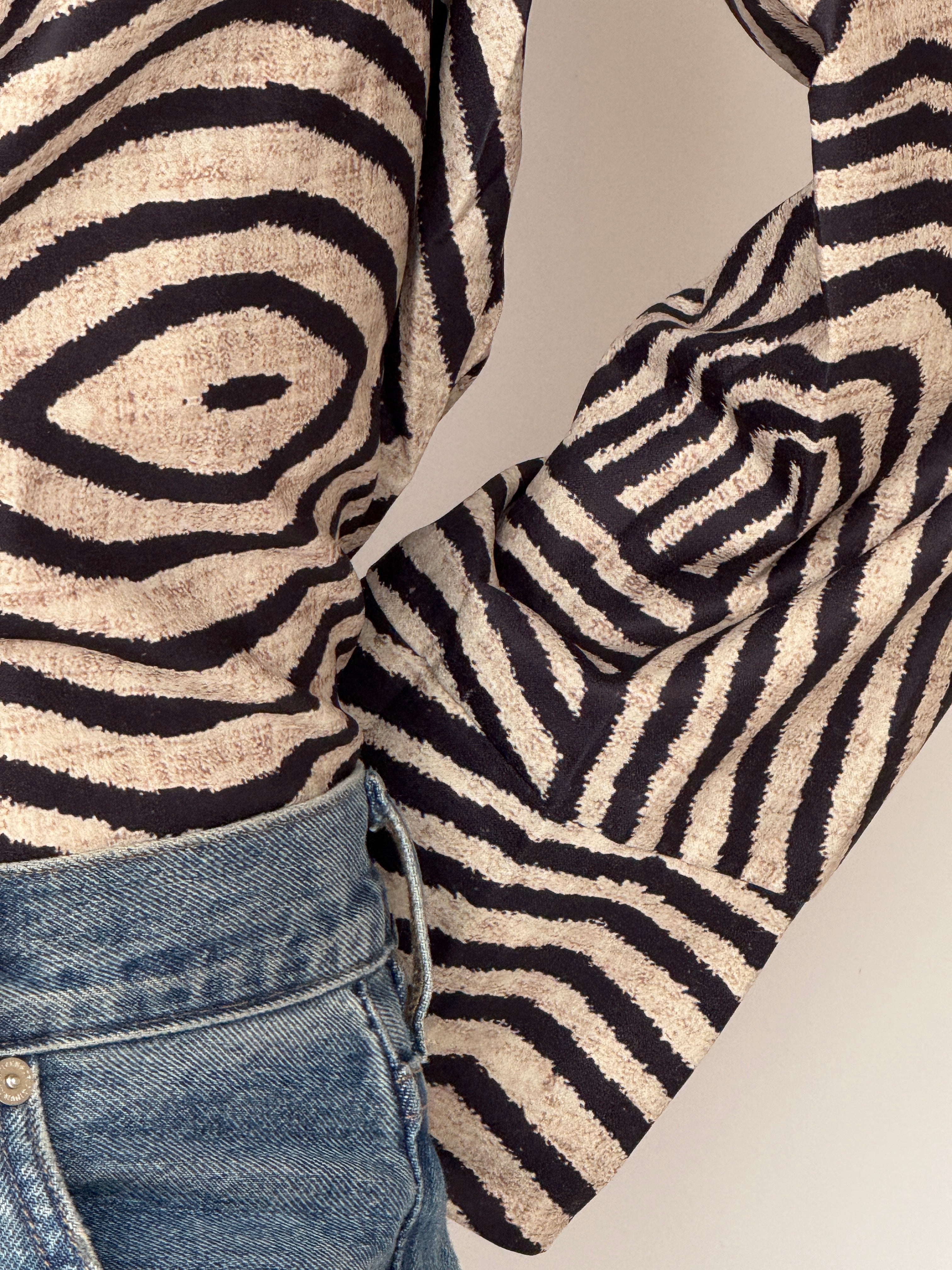 Vintage beige black abstract pattern close up