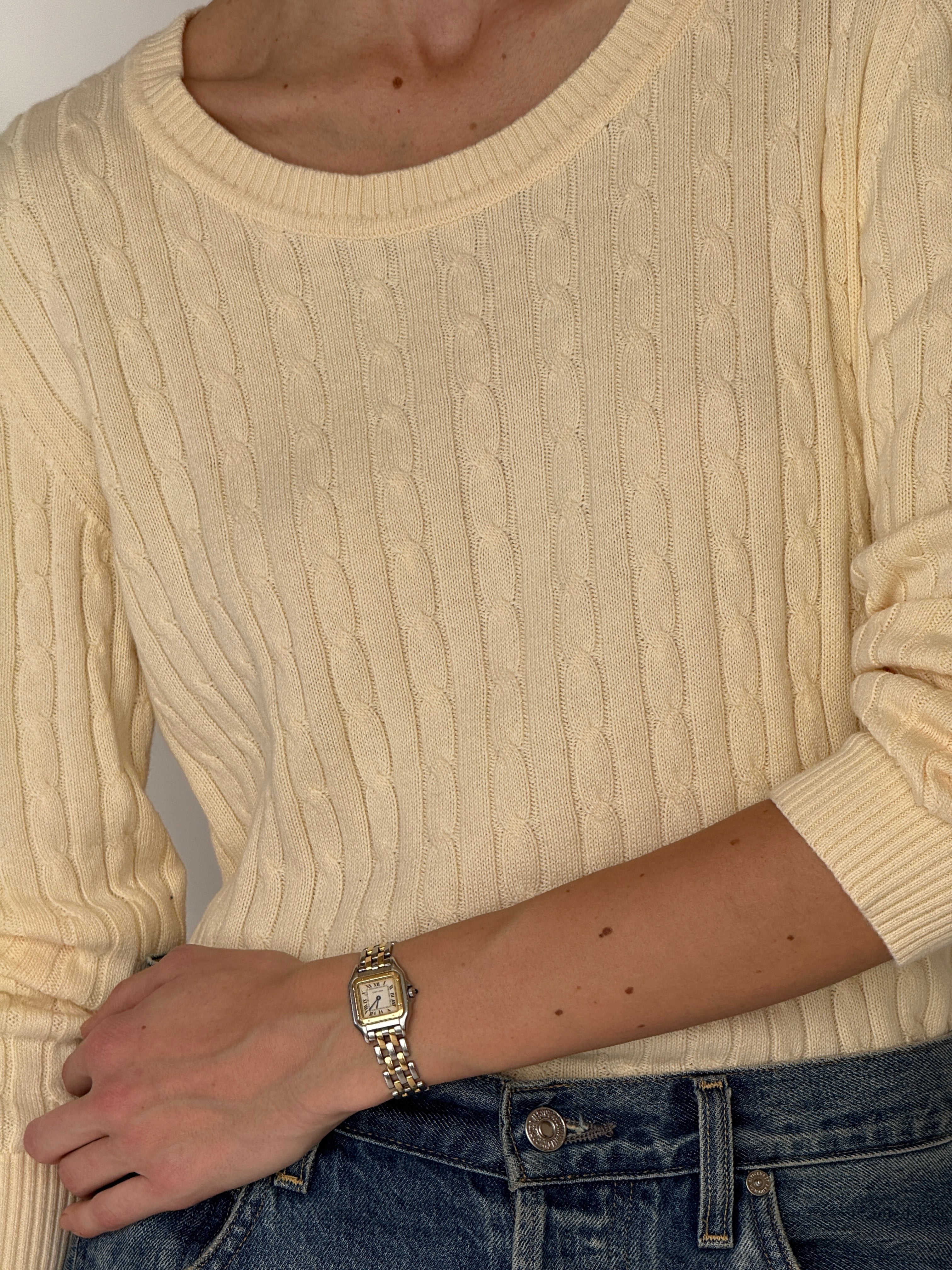 Vintage cream cable knit sweater neckline detail