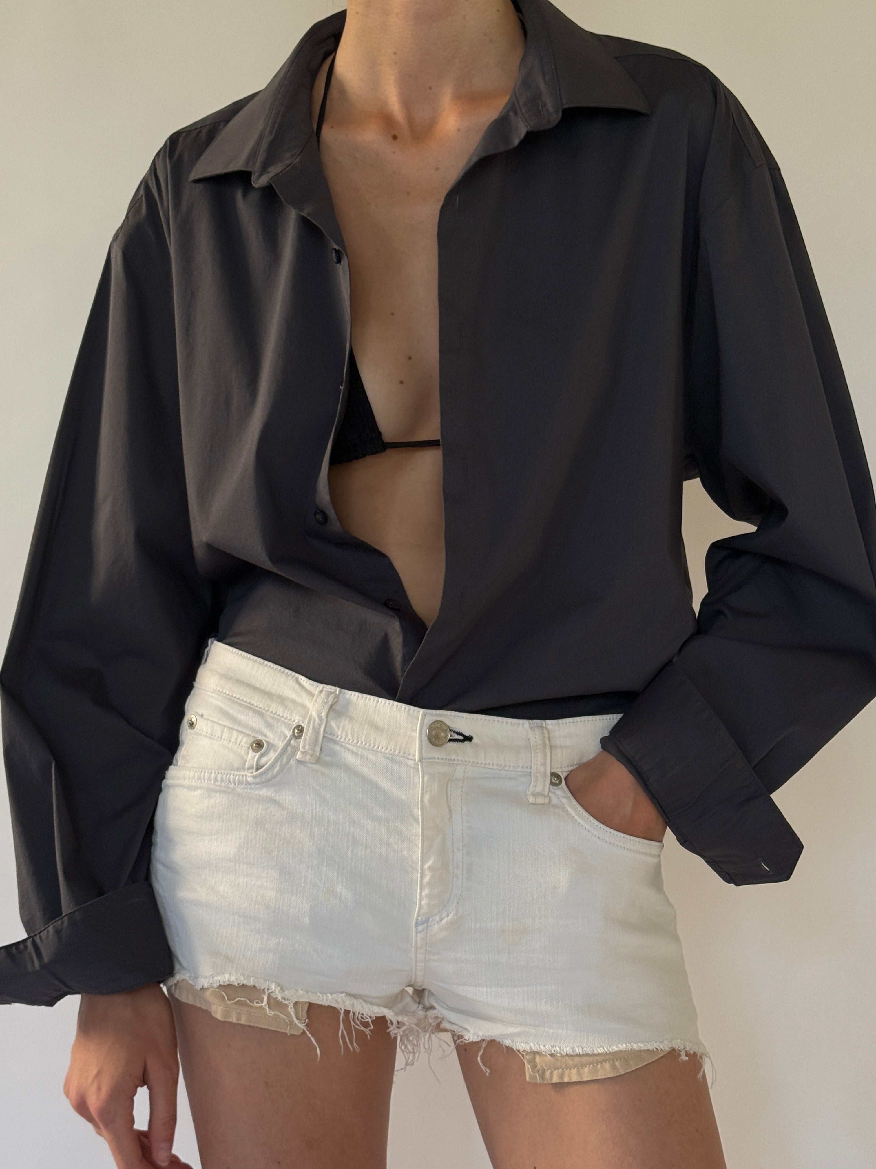 Vintage dark grey oversized shirt fabric close-up