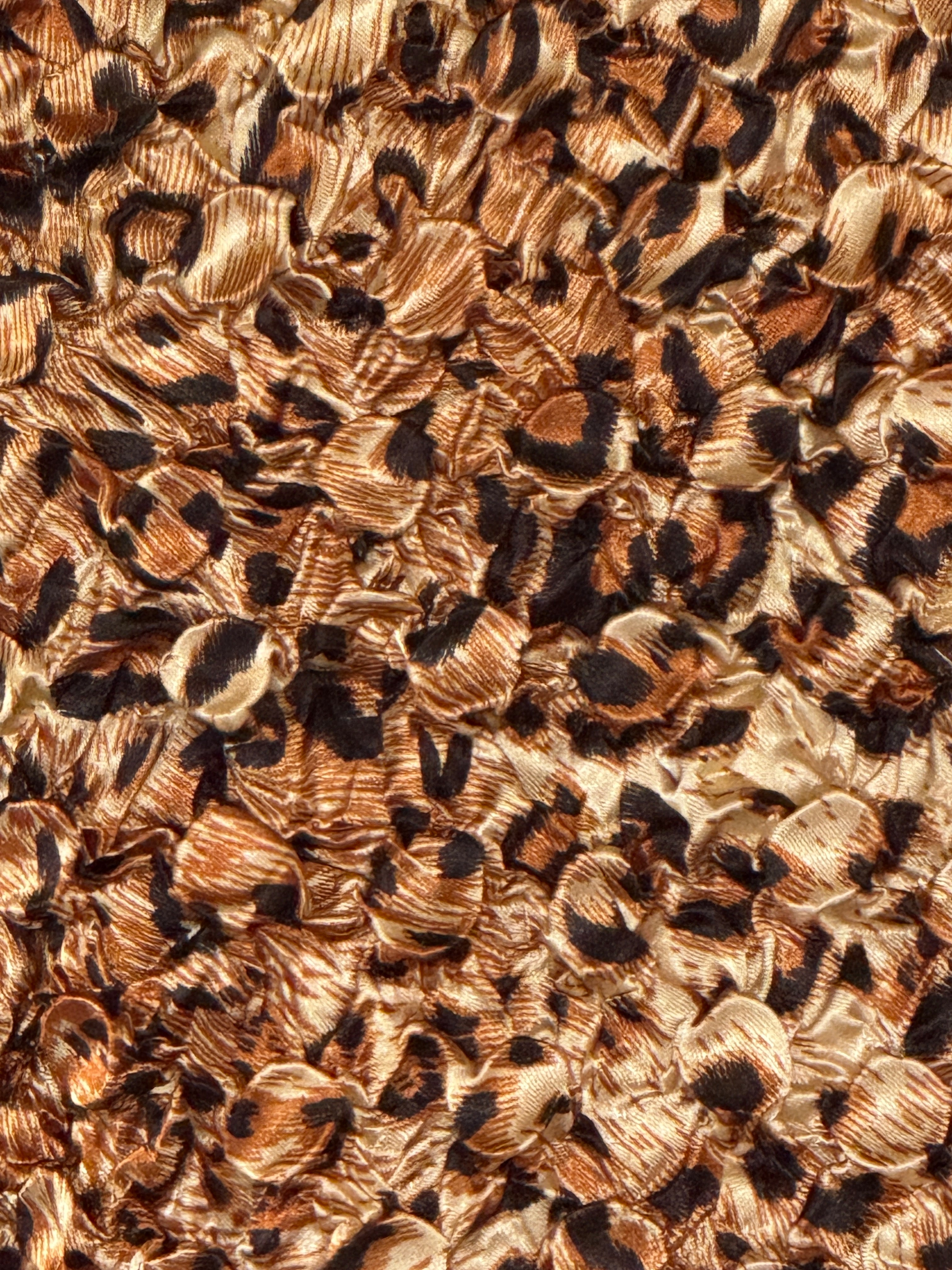 Vintage brown leopard print popcorn top fabric close-up