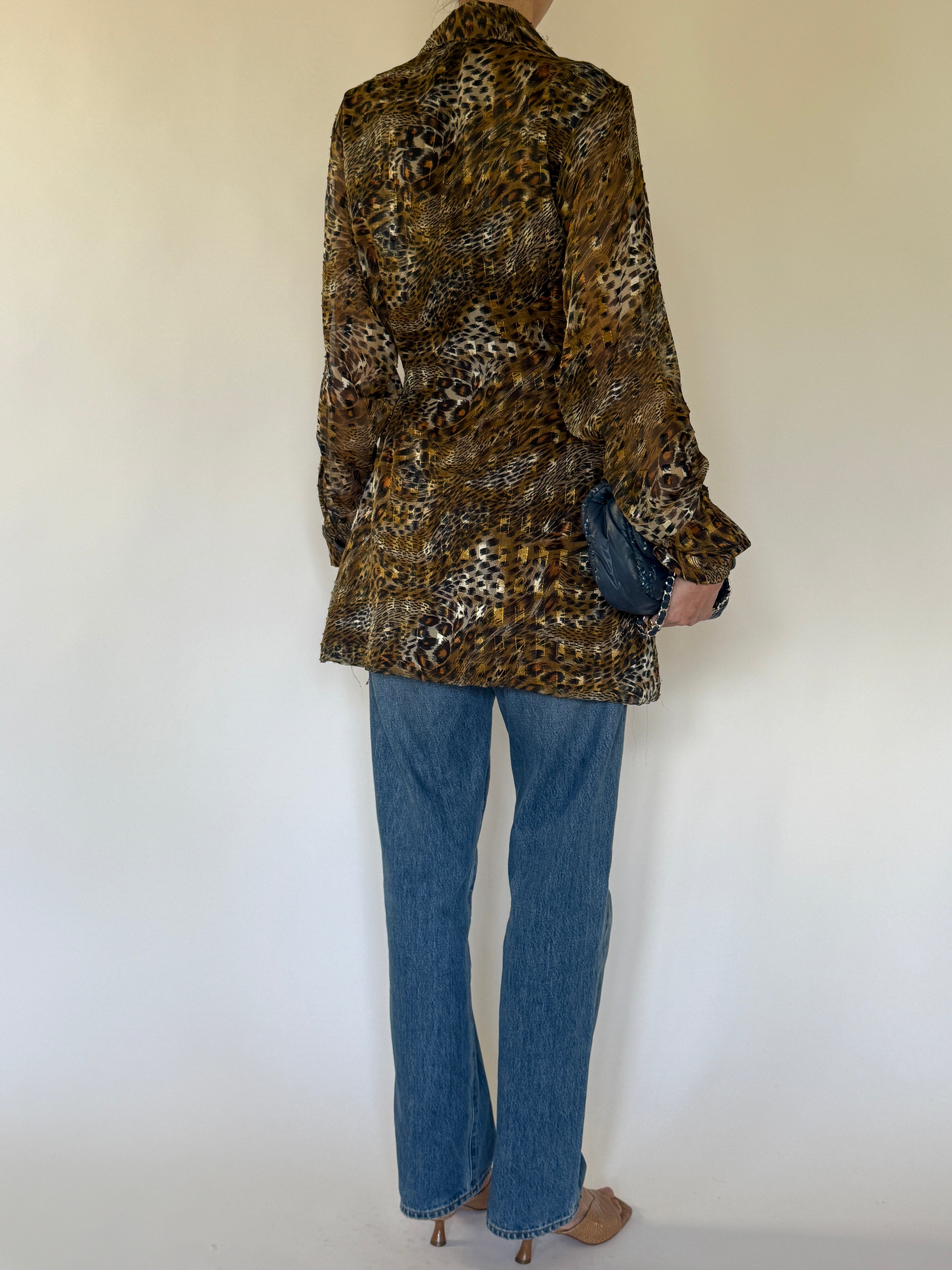 Vintage animal print jacket close-up of lapel and front button detail