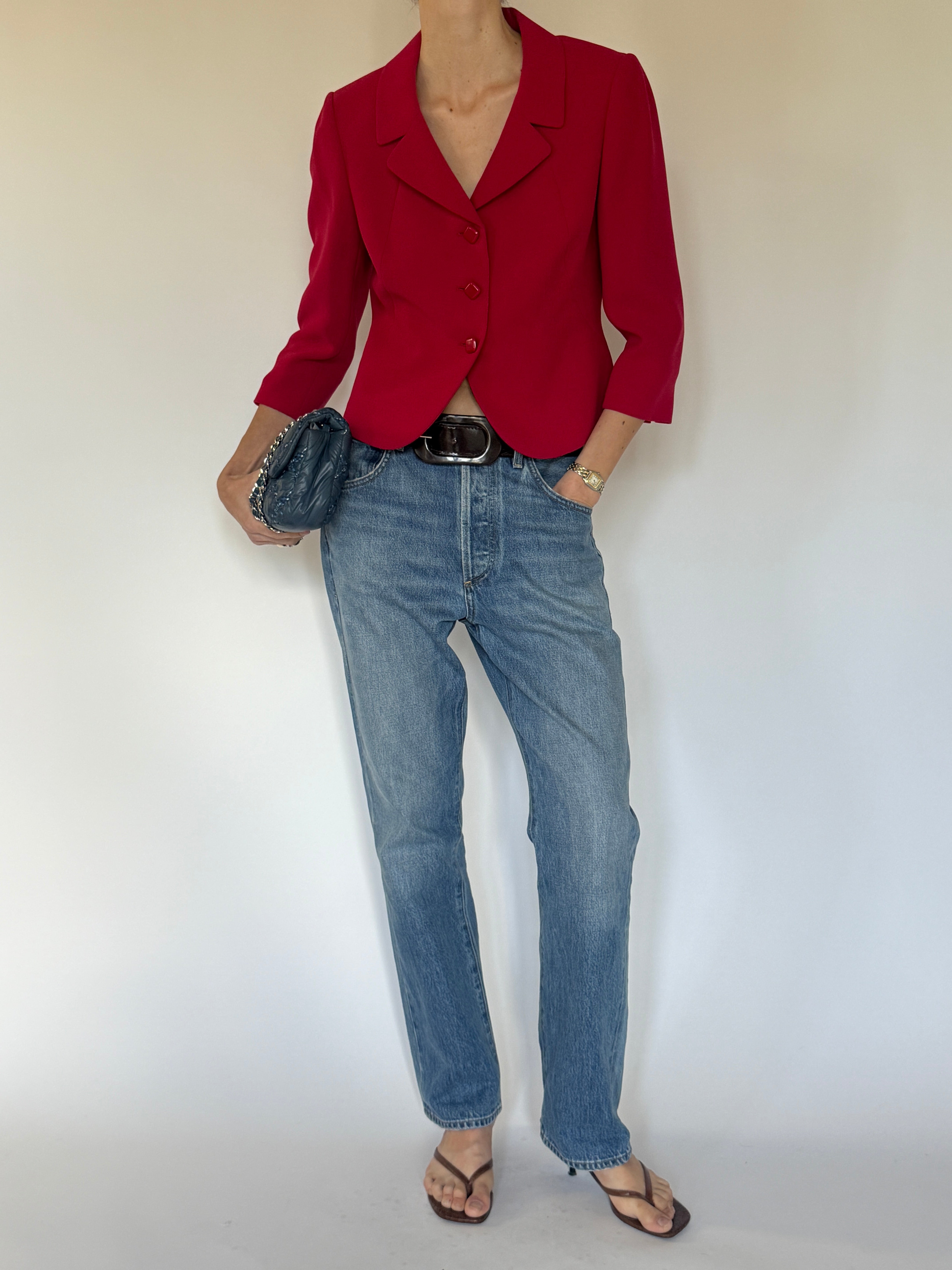 Vintage red blazer close-up of tonal buttons