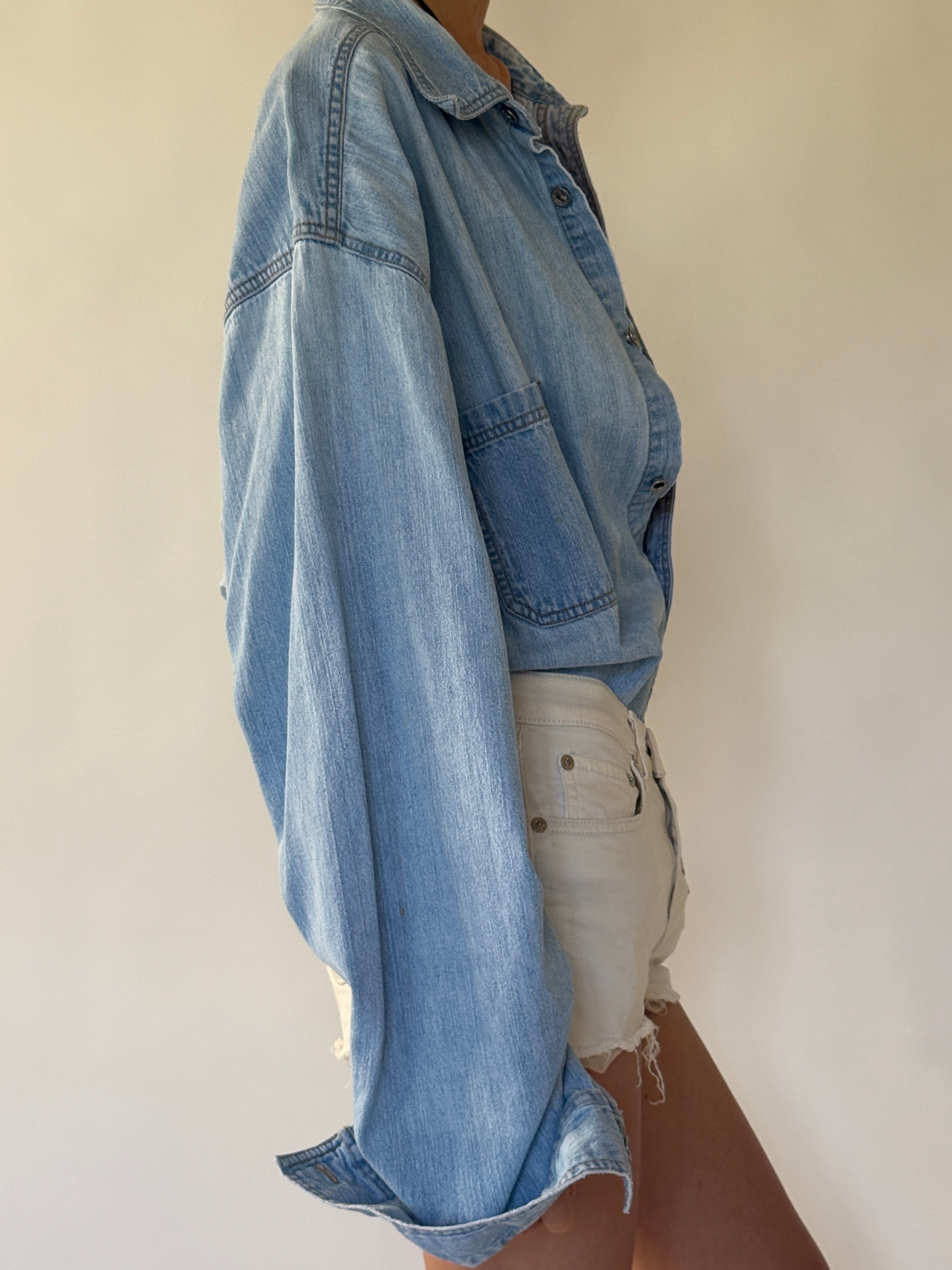 Vintage Levi's light wash denim shirt side view