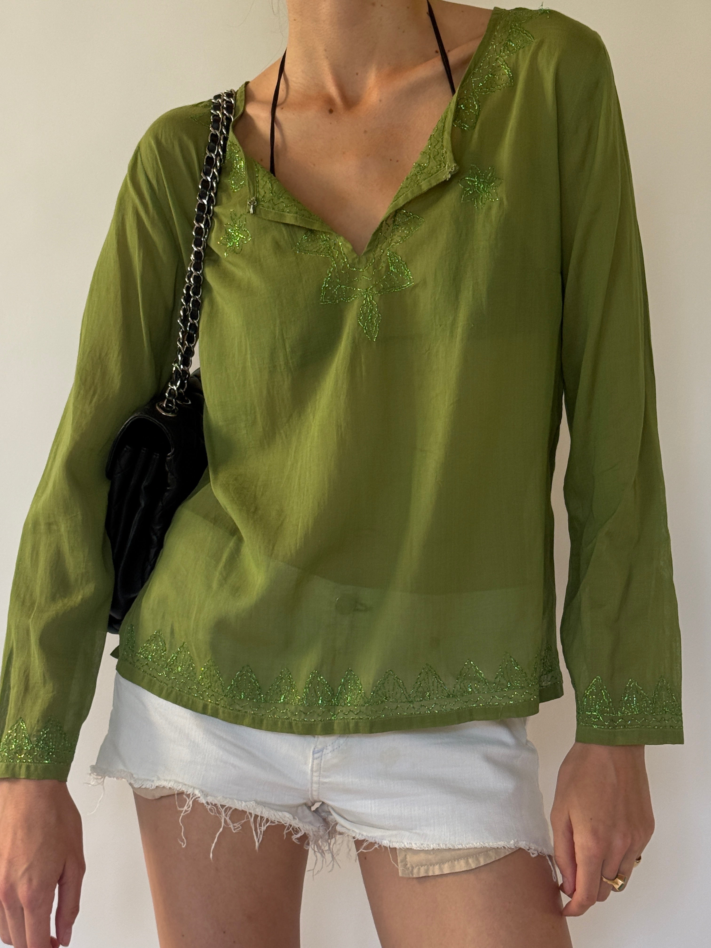 Vintage olive green viscose fabric close-up
