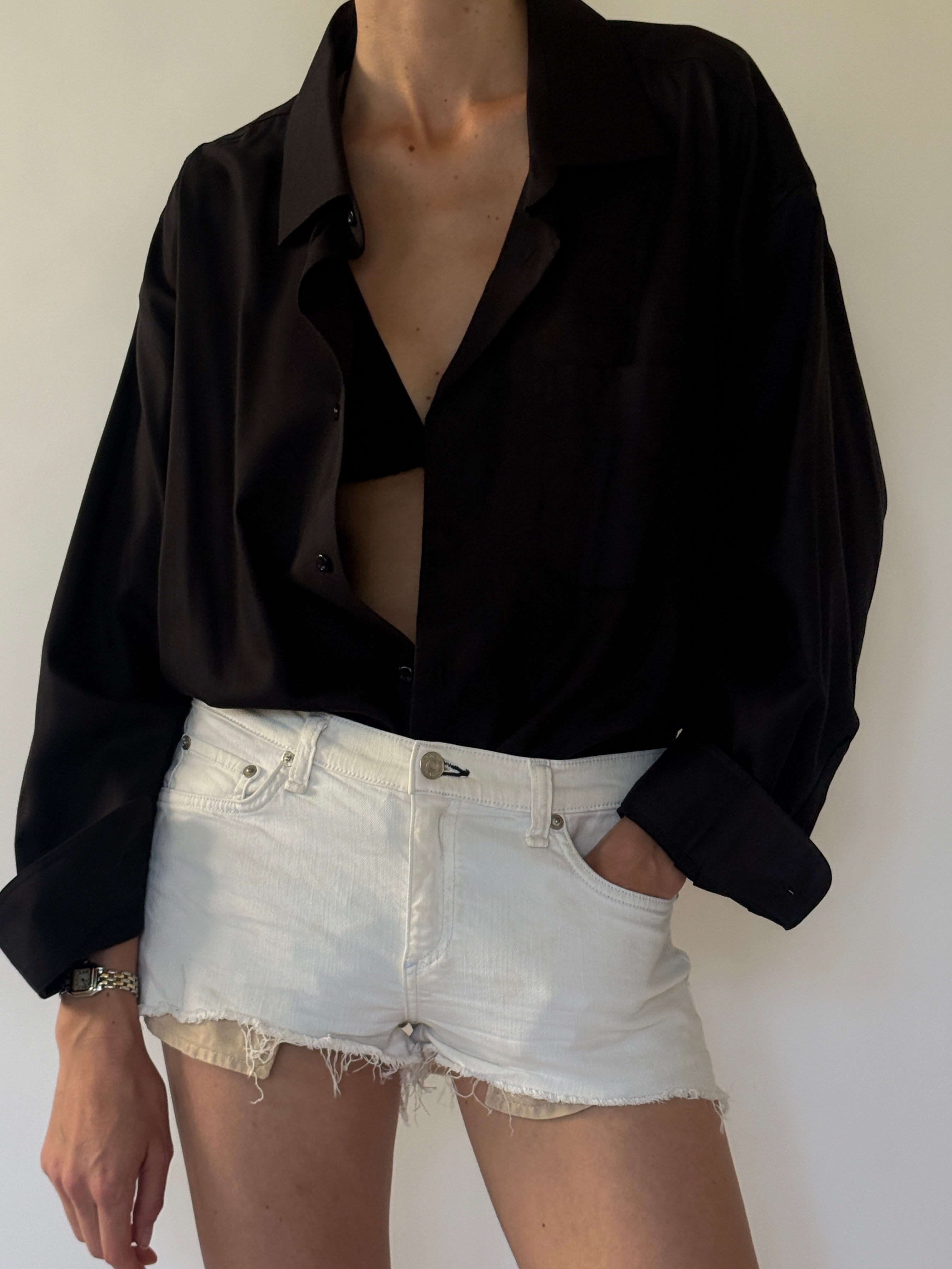Vintage black cotton fabric close-up